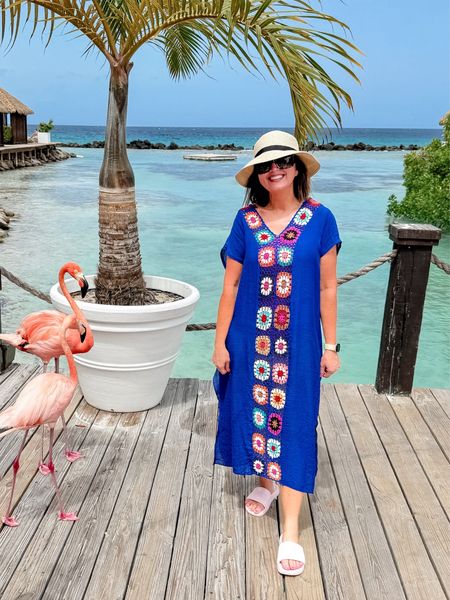 Amazon cover up, sun hat and sunglasses 
Beach must haves / Amazon fashion finds / beach trip / swim coverup 

#LTKOver40 #LTKTravel #LTKSwim