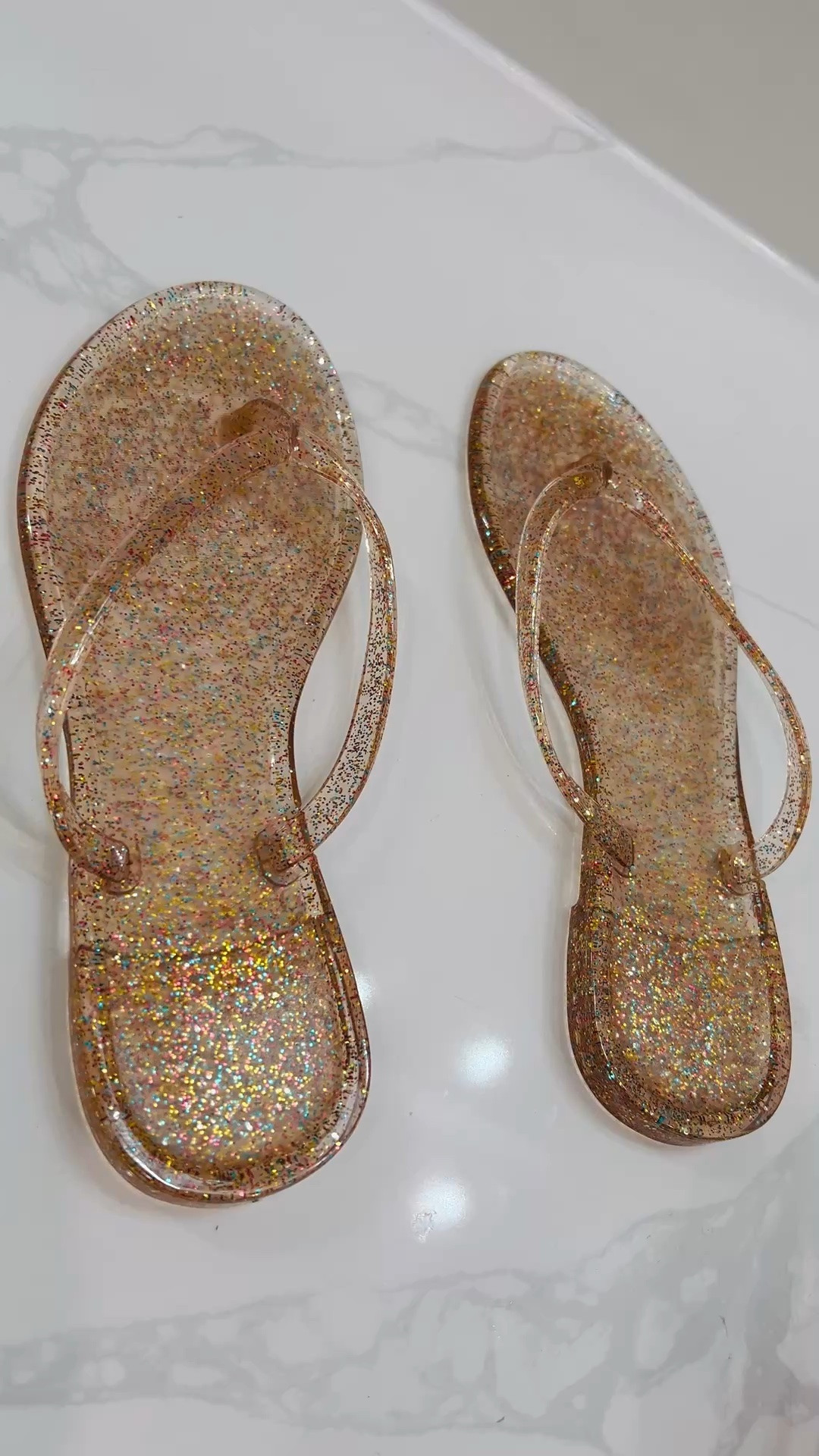Glitter jelly flip flops? Ummm YESSS please! Perfect for your next beach trip or to wear them by the pool.

#LTKootd #LTKmomlife #LTKSwim