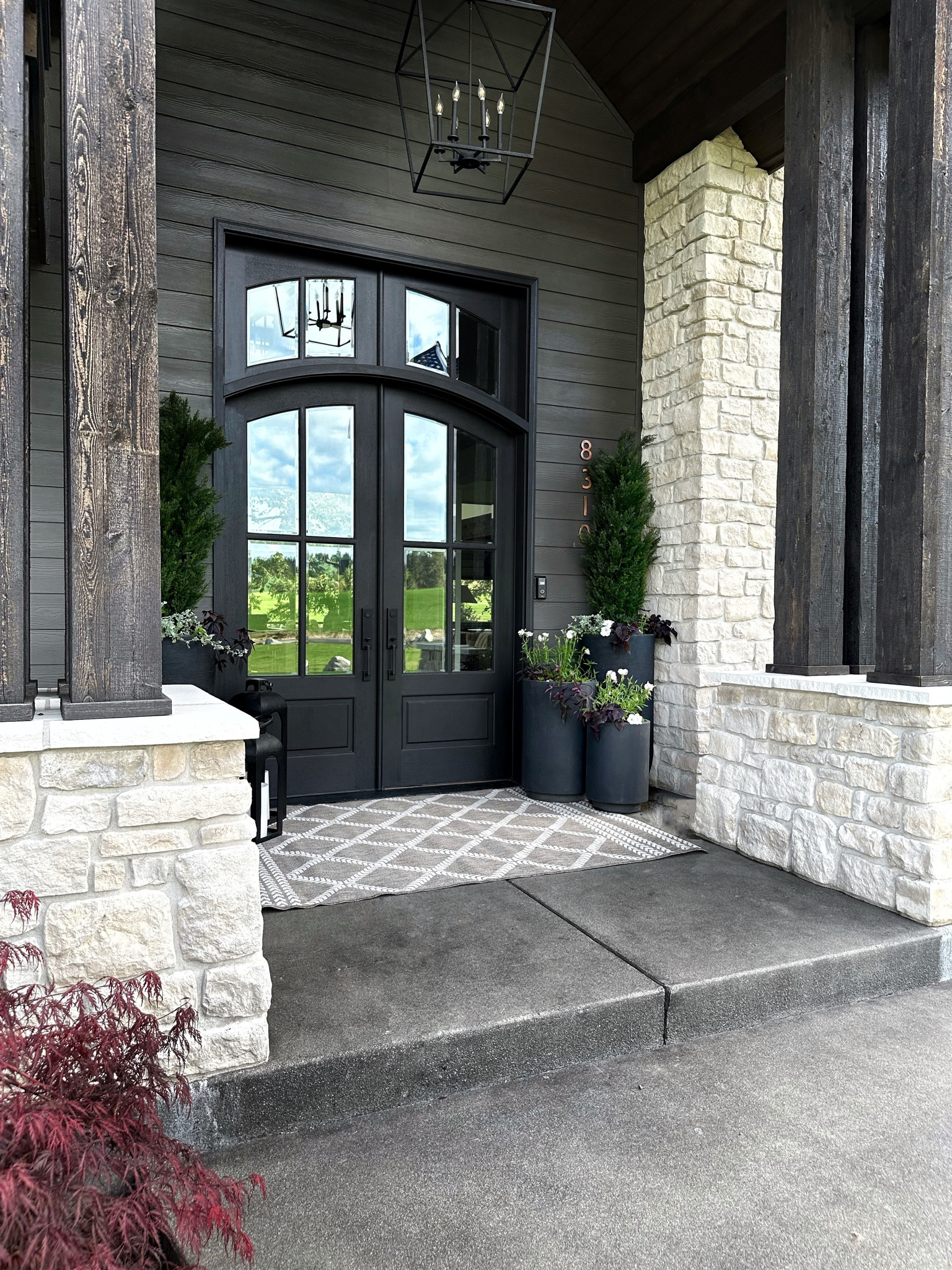 A front porch for summer.. 
It is that time of year, the mountains have melted, and I get to finally plant my front porch entry. This time around I went with a new vibe with FAUX trees from @homedepot, #ad and let me tell you I am SO pumped about how it turned out.  I wanted something grand this summer, especially with our big Graduate party right around the corner. These faux trees gave this entry a whole new look, and a vibe I am all about. I am planning on grabbing a few more for planters for around the house as well! You can grab them in multiple sizes and what fits your porch needs too! 

#thehomedepot #kickstartsummer