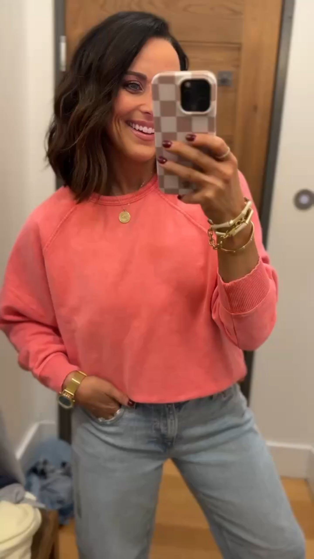 This coral color is gorgeous in real life! This American Eagle pullover is a wardrobe staple for spring and summer so easy to throw on over bathing suits after a beach or boat day! Aprilwilks VintagePickin women’s casual outfit ideas women’s American Eagle outfit ideas American Eagle sweatshirt outfit women’s casual American Eagle outfit 

#LTKootd #LTKgrwm #LTKFindsUnder100