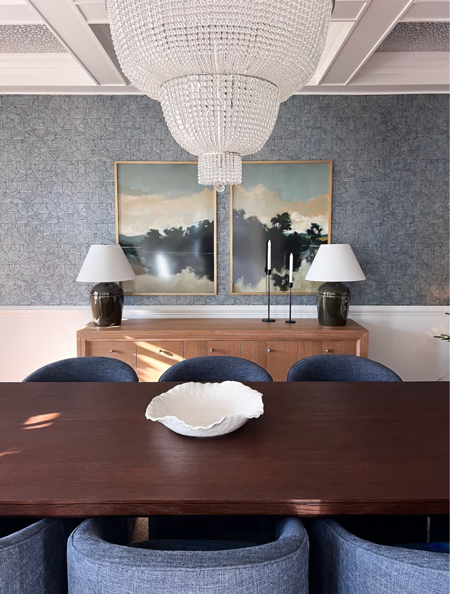 Love this moody dining room! It’s truly one of my denotes. The chandelier, sideboard, dining chairs (preference fabric!!), art, table lamp and candlesticks are all linked! 

#LTKFindsUnder100 #LTKStyleTip #LTKHome