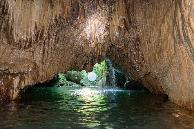 Cave, Waterfall and River Adventure in Charco Azul from San Juan | Viator – A TripAdvisor Company (US)