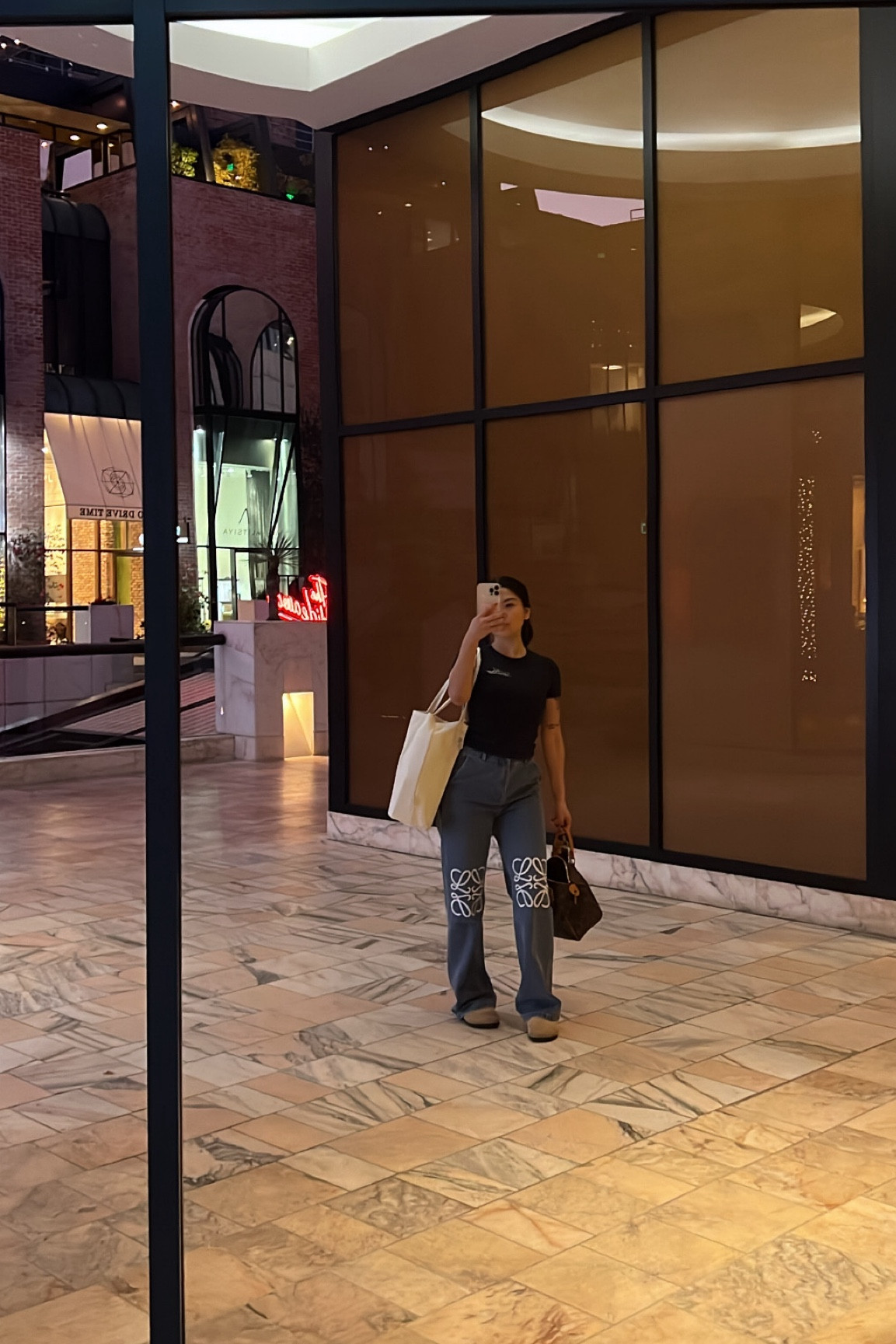 Rodeo Drive work OOTD 🥰 Skims black ribbed short sleeve + Loewe denim. My slippers are dupe Birkenstocks from Amazon. Classic LV Speedy 25.

#LTKStyleTip #LTKBeauty #LTKWorkwear