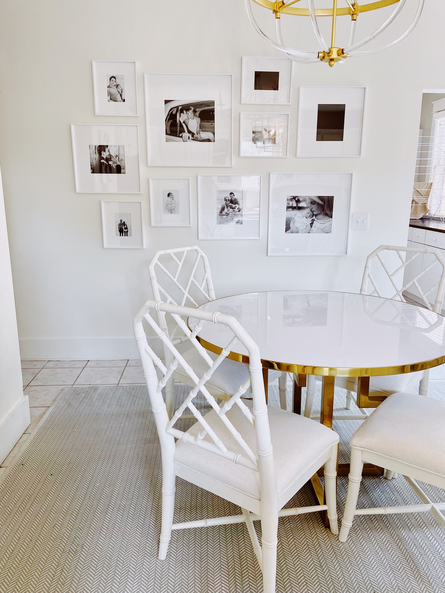 My kitchen is finally coming together! Satin brass kitchen table with white chippendale chairs. cb2 gallery frames with white mats on the wall. I linked the dupe of my kitchen chairs as well as the ones I have. Also linked my light blue kitchen rug (indoor outdoor so easy to clean) and chandelier 

Chippendale bay chair, white kitchen chairs, White Rattan Dining Chair

Light blue herringbone rug, indoor outdoor rug, kitchen rug, low profile rug

Cream and gold light, distressed light fixture, gold light fixture , lantern light fixture , kitchen light fixtures , kitchen light fixture 

Gallery frames, gallery wall, Modern History Center Table - White Acrylic, white acrylic kitchen table, breakfast table, round white center table, round white breakfast table, Six Light Chandelier with Acrylic Frame and Gold Leaf Details, gold chandelier , Astor Hollywood Regency Clear Frame Gold Leaf Metal Candle Style Chandelier


#LTKhome