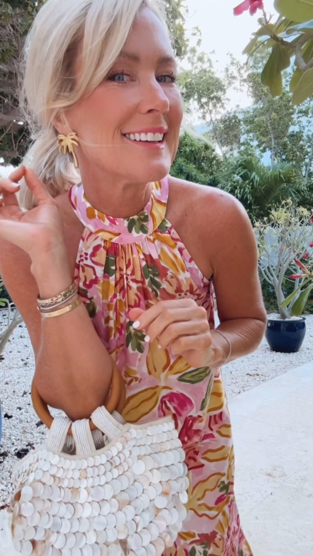 So many fun dress options for vacation this high halter neck floral dress is absolutely stunning and I love the print! 

Size: small 

#LTKootd #LTKOver40 #LTKTravel