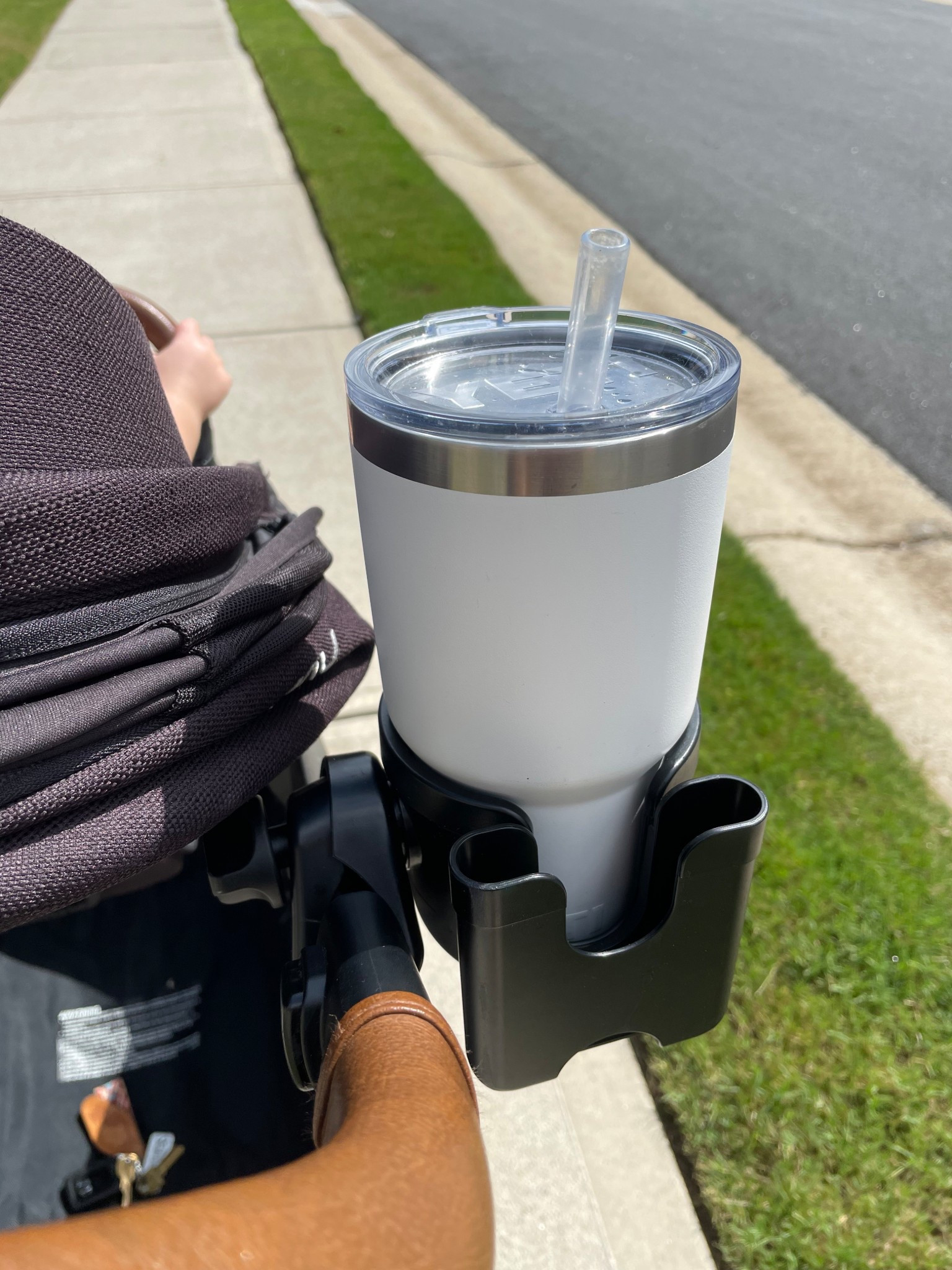 The best universal stroller cupholder with a phone slot as well!! 

#LTKFamily #LTKBaby #LTKKids
