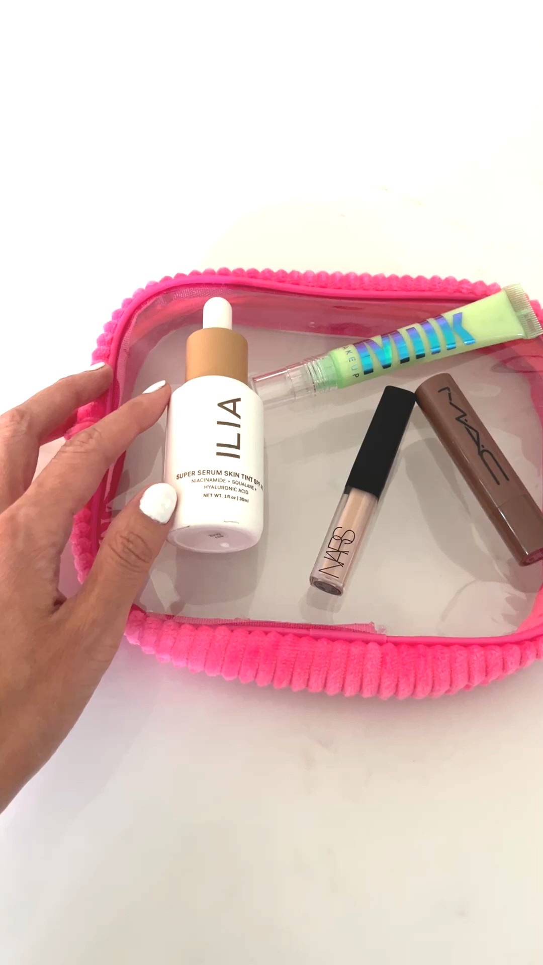 Fave beauty product finds I’ve been using in my Beach Riot toiletry bag: Ilia Serum Skin Tint with SPF, Milk Makeup Hydrogrip eyeshadow and concealer primer, NARS Radiant Creamy concealer, MAC cosmetics squirt plumping lip gloss stick

Especially love the Ilia serum for a glowy look that adds spf as well. With a tint, looks great alone and layers well under foundation ❤️

#LTKBeauty #LTKOver40 #LTKFindsUnder50