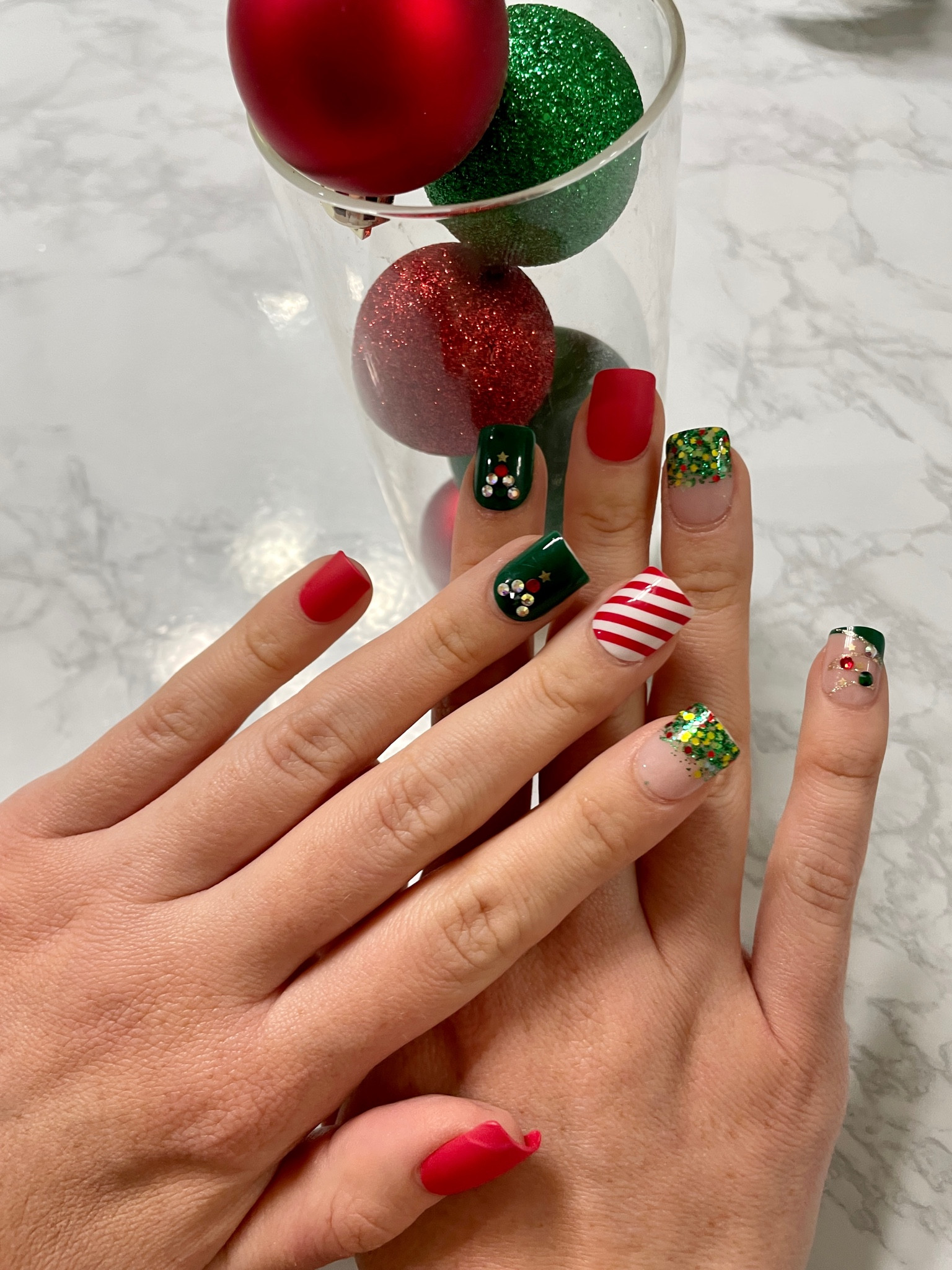 Cute DIY press on holiday nails! I did these live on Pinterest TV rewatch it on there for a quick tutorial to get them to last :) love them for a last minute set that will last several days! They’re also $8.99 😍

#LTKbeauty #LTKstyletip #LTKunder50