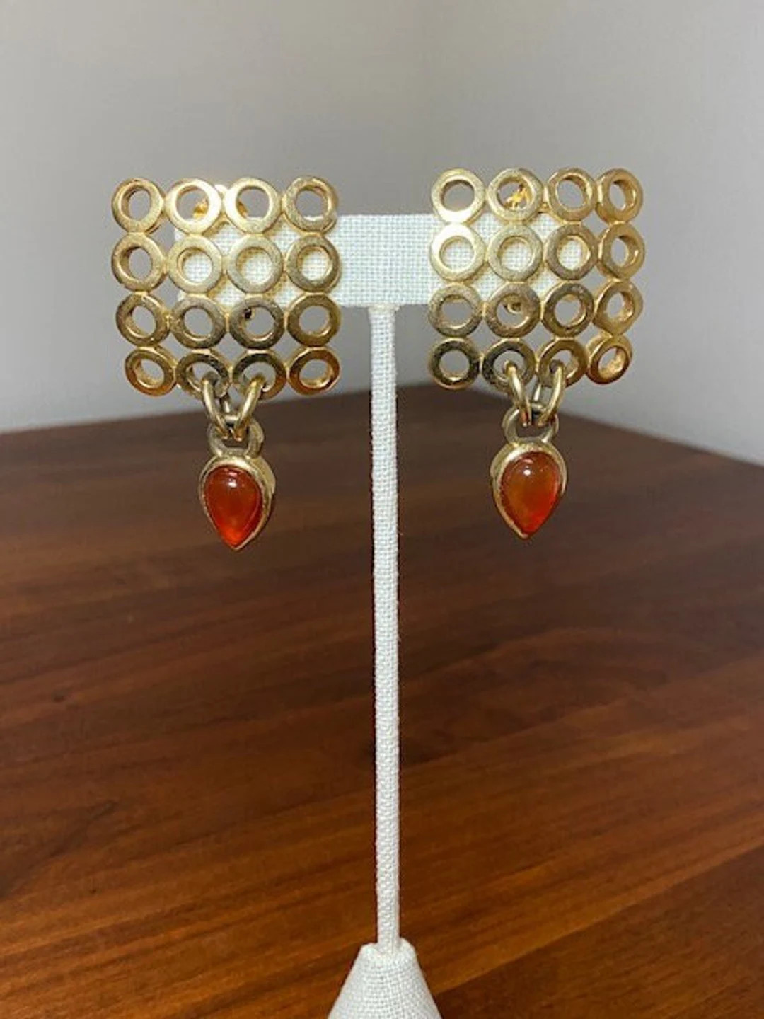 Vintage Randal Carnes Modernist Artful Clip-on Earrings in Gold Plated Metal with Orange Teardrop... | Etsy (US)