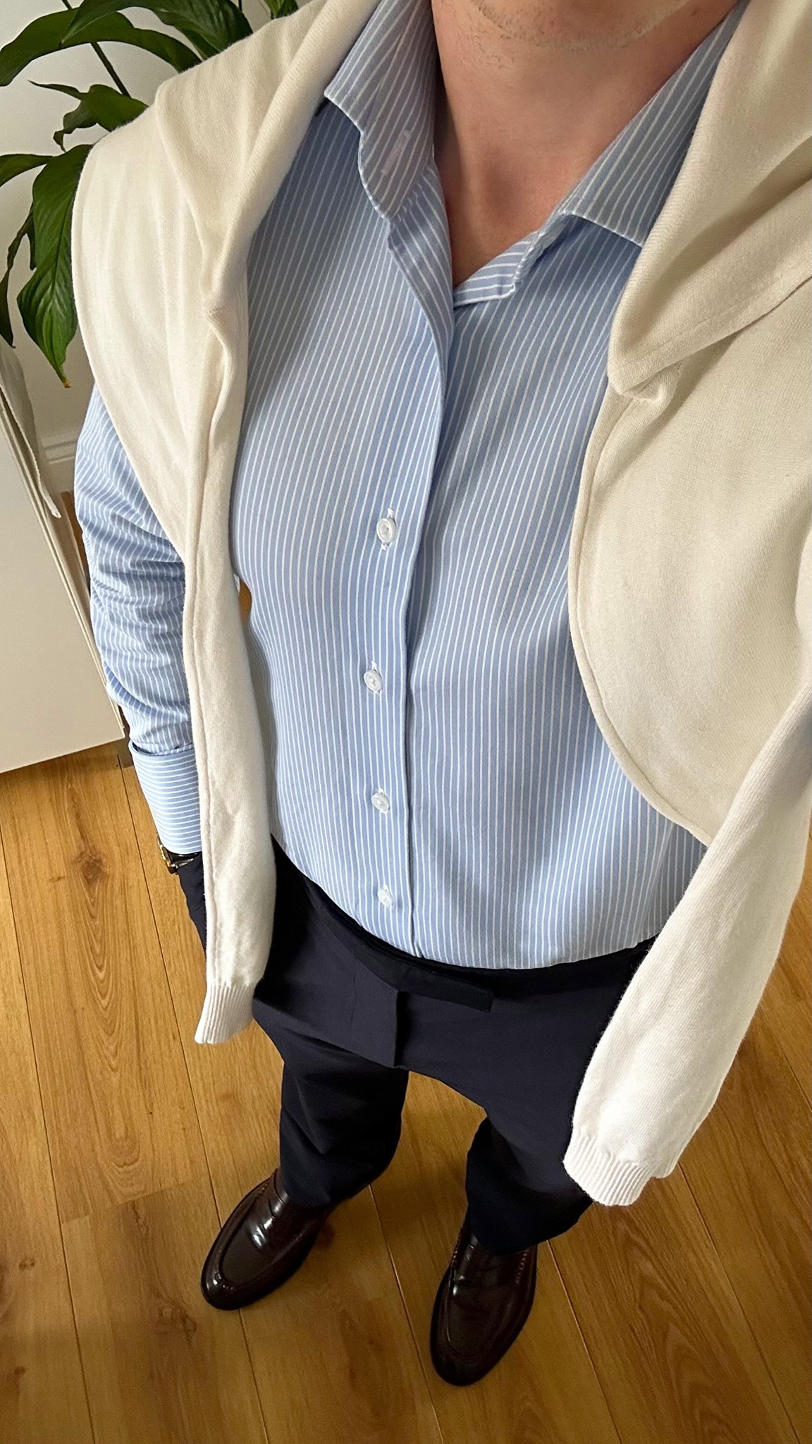 Elevated office style for the week! ✨

Keeping it classic with a crisp blue and white striped tailored shirt (monogrammed for that personal touch), navy trousers, and a cream knit jumper draped effortlessly over the shoulders. Finishing the look with oxblood loafers for a refined pop of color.

A polished yet effortless workwear look that never goes out of style!

#OfficeOutfit #WorkwearStyle #ClassicMenswear #LTKMensFashion #SmartCasual

#LTKmens #LTKuk #LTKworkwear