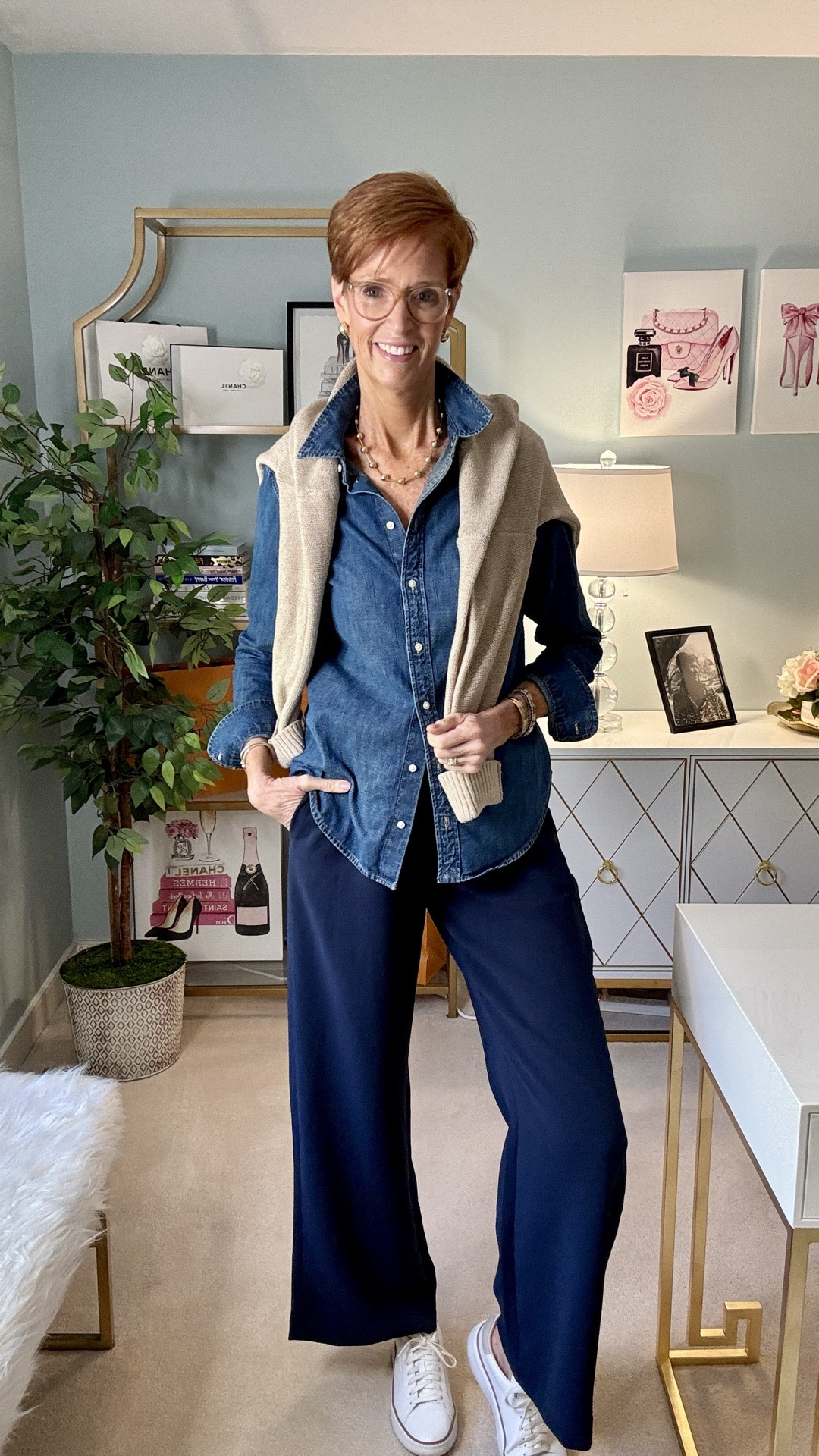Some outfits work because they're trendy.
Some outfits work because they make getting dressed easier.
This is one of those outfits.

A denim shirt, comfortable pull-on pants, white sneakers, and a lightweight sweater over the shoulders is a combination that works for so many real-life situations: travel days, running errands, working from home, casual lunches, or simply those mornings when you don't want to overthink what to wear.

What I love most about this outfit formula is that it feels polished without sacrificing comfort. Most women already have versions of these pieces in their closets, which makes it easy to recreate and wear on repeat.

Would you wear this for travel, errands, lunch with friends, or all three?

Save this outfit for later, send it to a friend who loves effortless everyday style, and follow along for more timeless outfit ideas for tall women and women over 40.

#TallWomenStyle #EverydayOutfitIdeas #WomenOver40Style #CasualChicStyle #TravelOutfitIdeas

#LTKootd #LTKOver40 #LTKTall