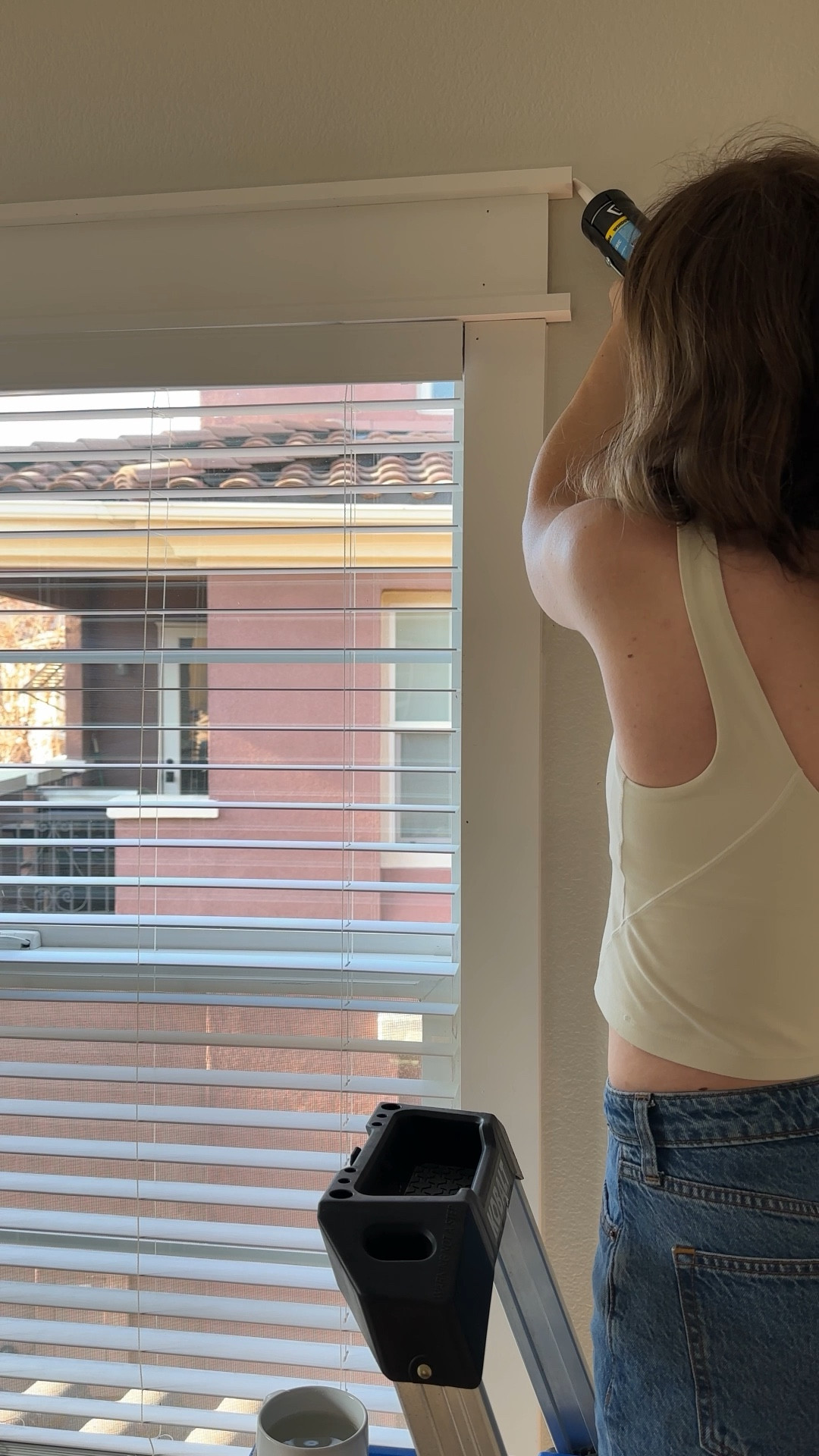 Home renovation, caulking for the first time. Casual clothes, Abercrombie taper jeans and align tank top in bone  

#LTKHome