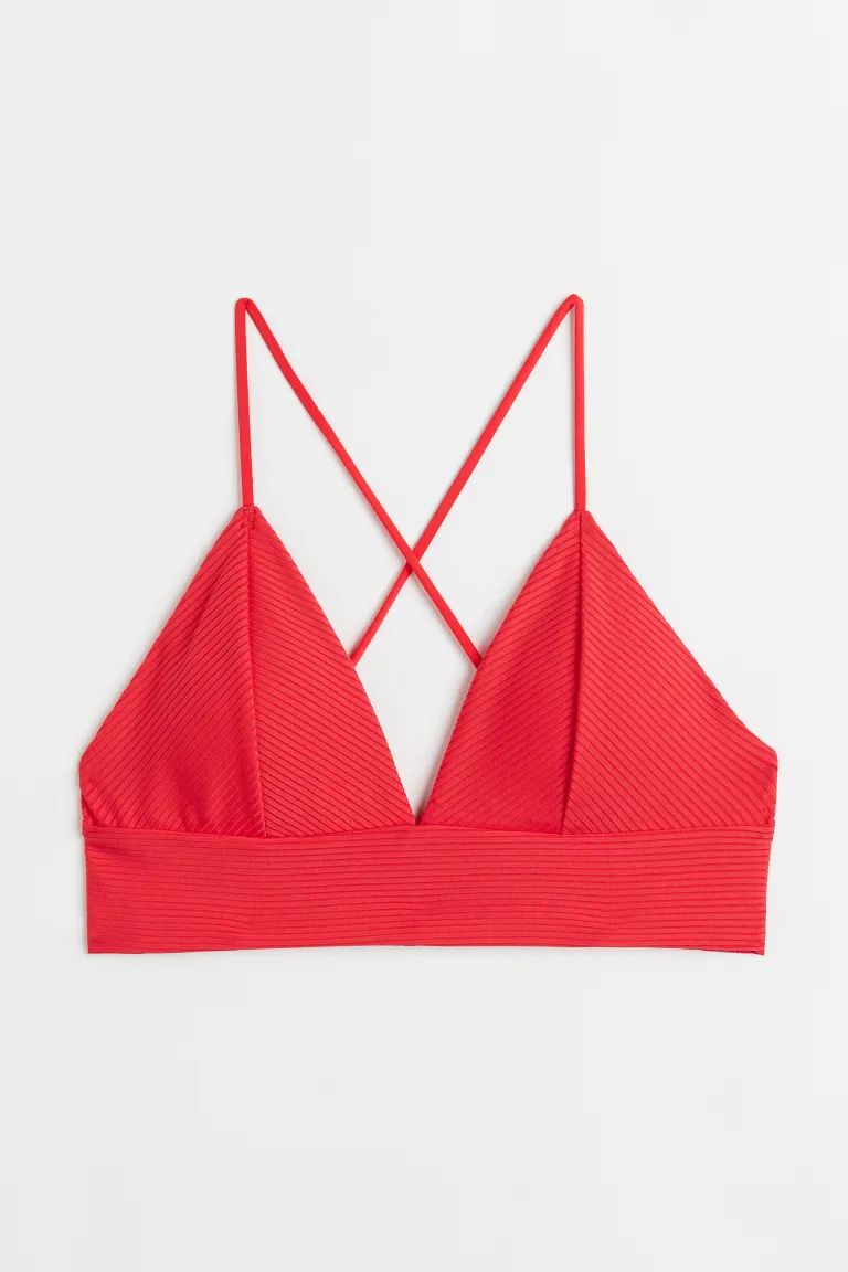 Lined, soft-cup bikini top. Narrow, adjustable shoulder straps crossed at back, triangular cups w... | H&M (US + CA)