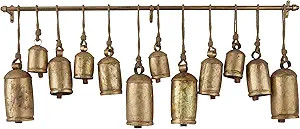 Deco 79 Metal Decorative Cow Bells Tibetan Inspired with 12 Bells on Jute Hanging Ropes and Rod, ... | Amazon (US)