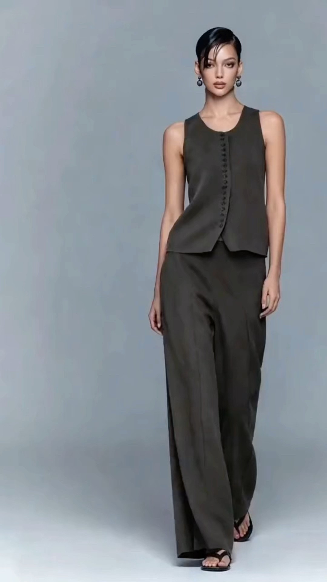 Dark olive green linen vest and wide-leg pants set, blending minimalist tailoring with understated, everyday elegance.

#LTKootd #LTKOver40 #LTKWorkwear
