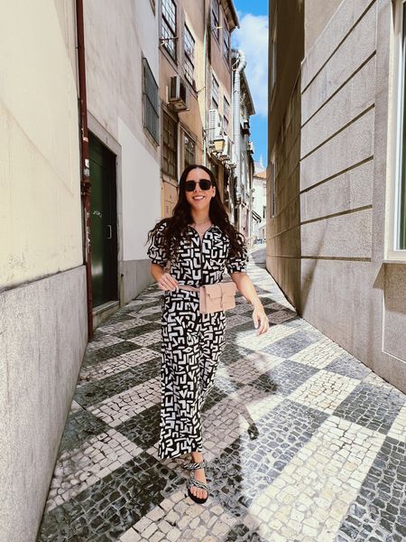 A fun printed jumpsuit plus a cute and functional belt bag is the perfect travel outfit to explore a new city 

#LTKfit #LTKitbag #LTKeurope