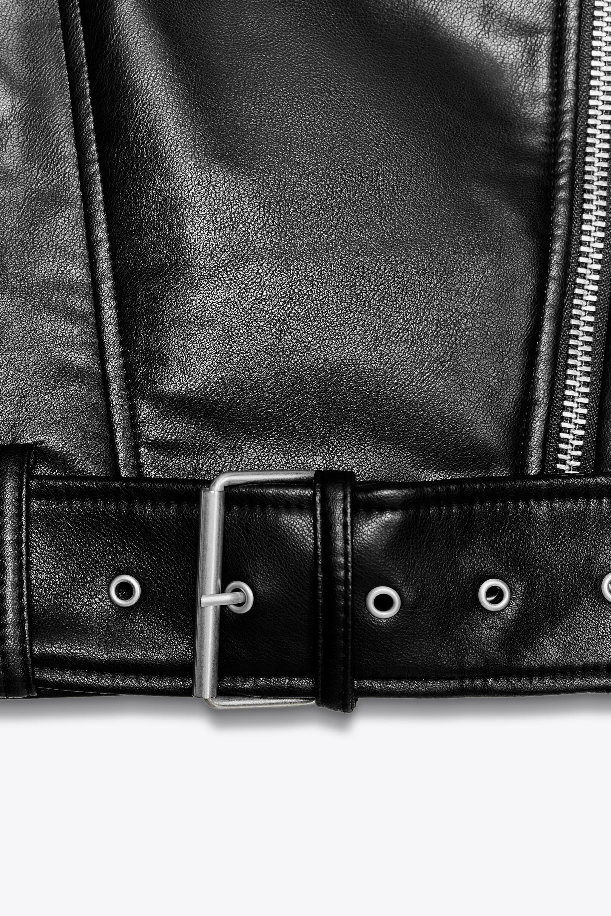 Lapel collar jacket with long sleeves and epaulettes. Front metal zip pockets. Self-belt with met... | Zara US