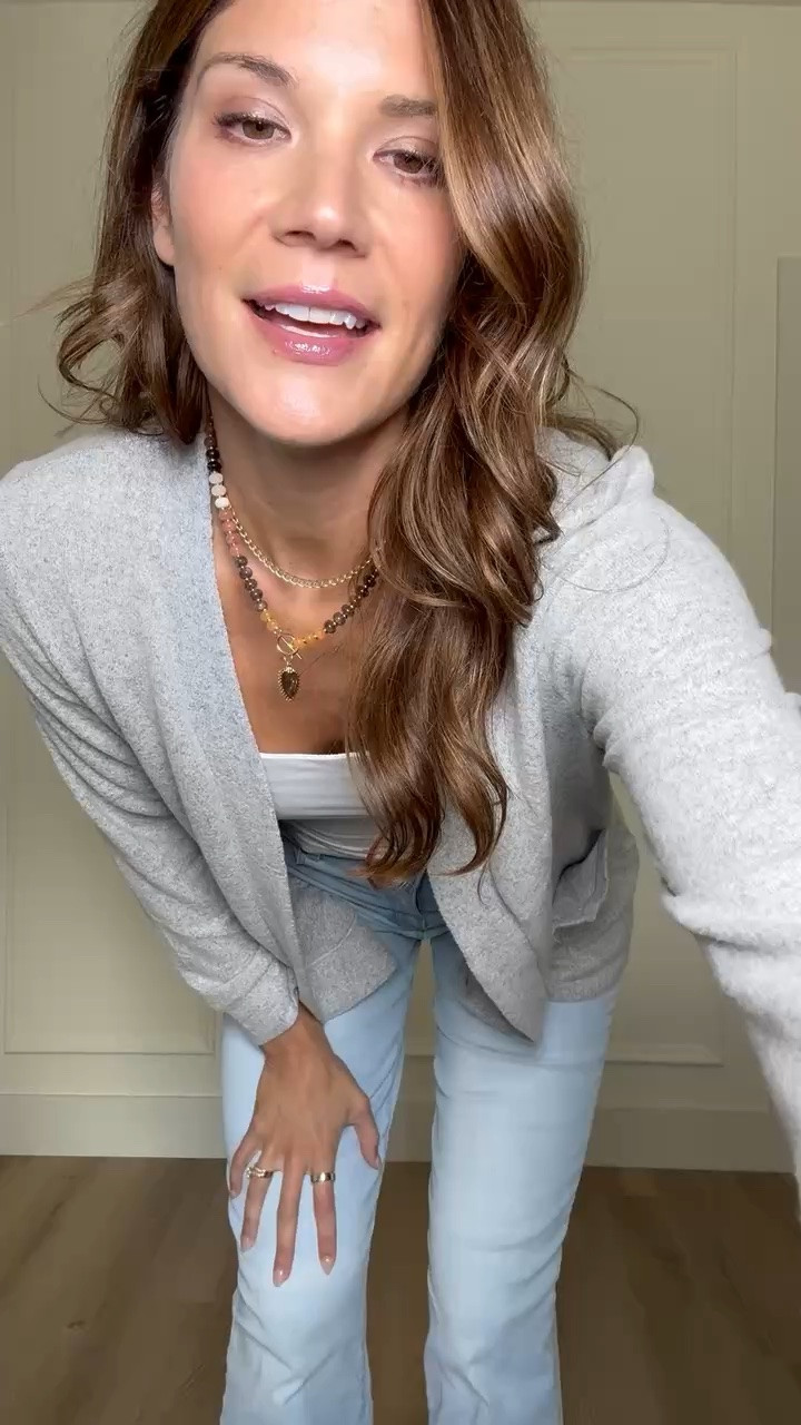 This soft gray cardigan is the kind of layer that works with almost everything in your closet. I love it over a simple white tank with light wash jeans for an easy fall outfit you can wear on repeat.

Gray cardigan, Fall cardigan, Light wash jeans, Tall girl fashion, Tall friendly clothing, Fall layering, Cardigan outfit, Casual fall outfit, Neutral fall style, Everyday outfit, Jeans and cardigan, StangandCo