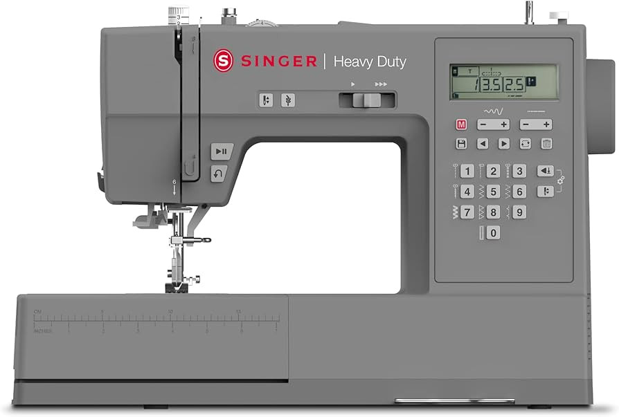 SINGER | HD6700 Electronic Heavy Duty Sewing Machine with 411 Stitch Applications - Sewing Made E... | Amazon (US)