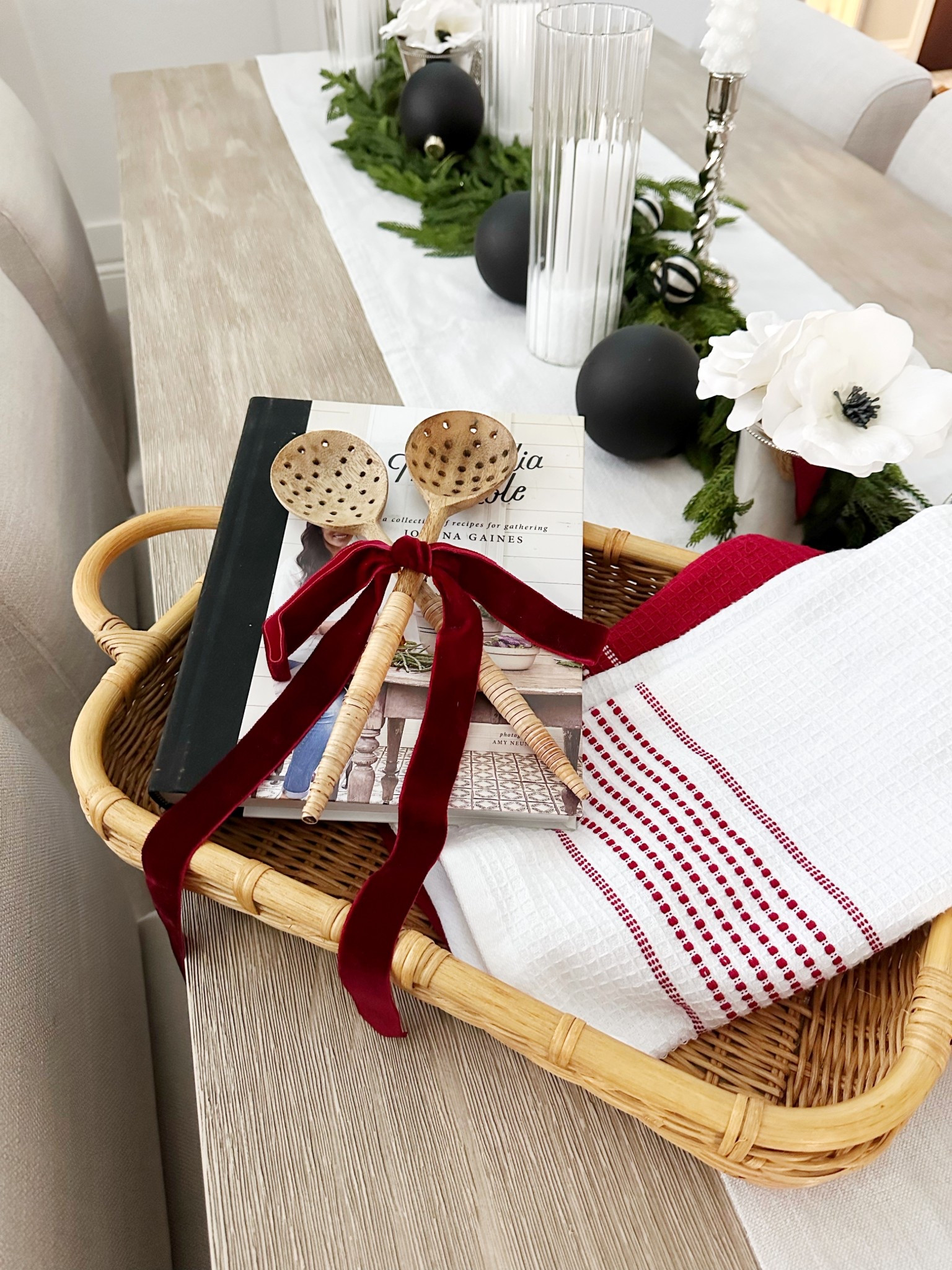 Fill a woven tray with a cookbook, utensils, and kitchen towels for a sweet, thoughtful, holiday gift that they can use all your long. This one also also doubles as a casserole dish holder. So pretty for the holidays! 

#LTKHome #LTKHoliday #LTKGiftGuide