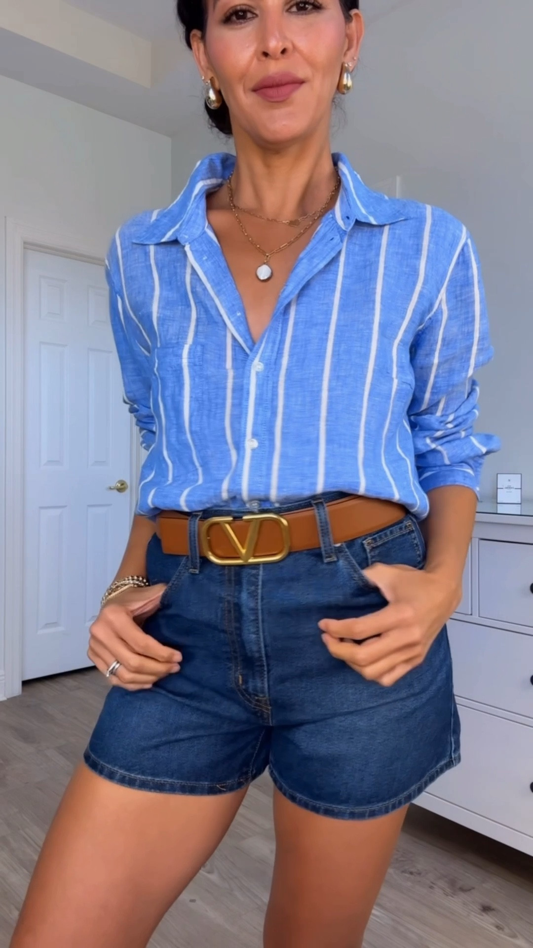 All details below ⬇️Adding this year’s similar version of the linen shirt. Wearing a size large in the linen shirt. Size 27 in both denim shorts,  for a looser fit .on sale now! Lipstick color is light mauve.
T-shirt is small 
Shoes are true to size. 
Valentina belt is 1.7 inches in reversible black/brown. 

 I am 5’7” | 130 pounds 

#LTKootd #LTKSaleAlert #LTKMothersDay