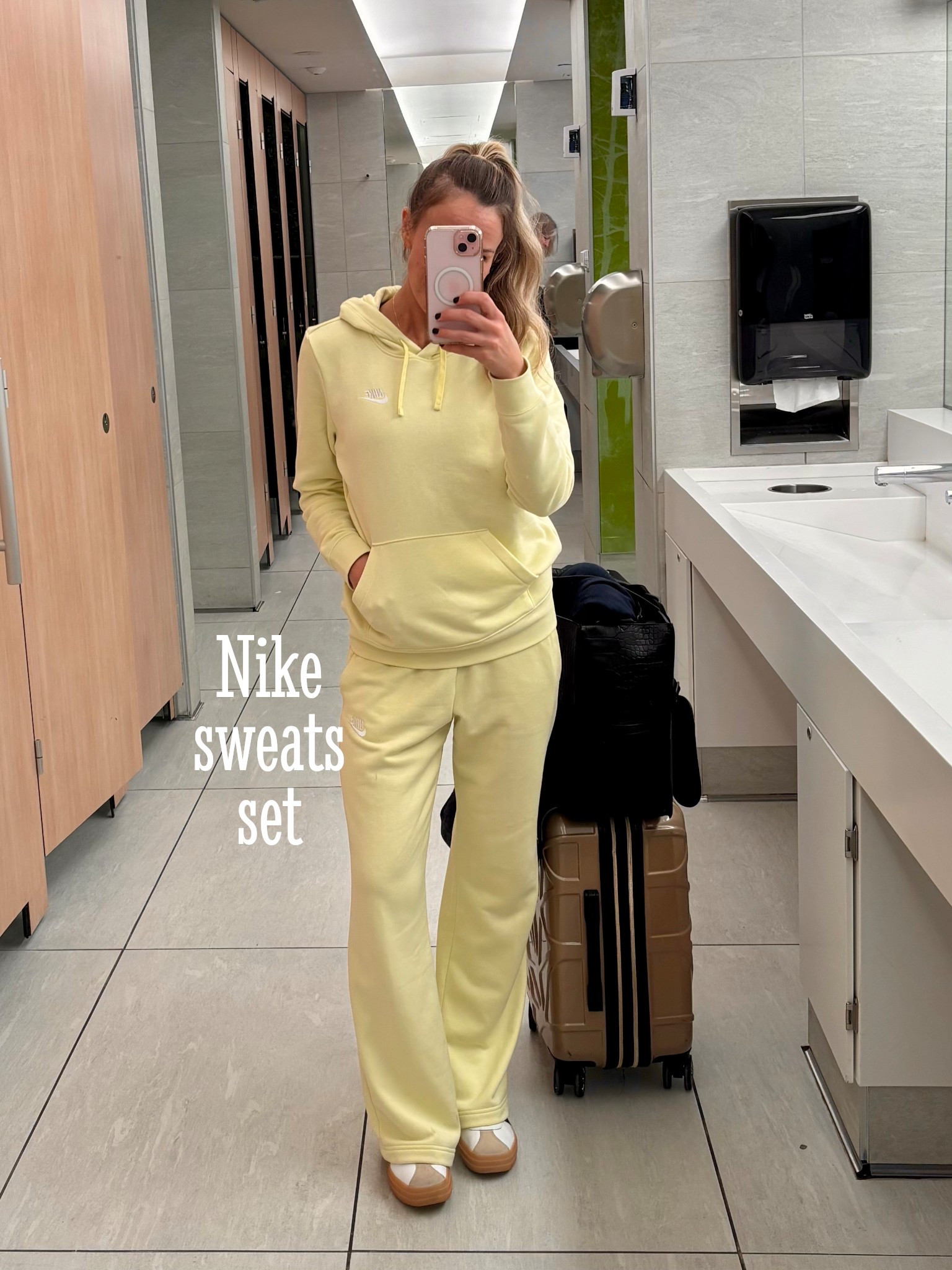 Loved this set for traveling!! So comfortable and cute! I’m wearing a small in the hoodie and pants, but could have gone with medium for a more oversized look  I also linked my shoes and favorite travel bag!

#LTKActive #LTKTravel #LTKSaleAlert