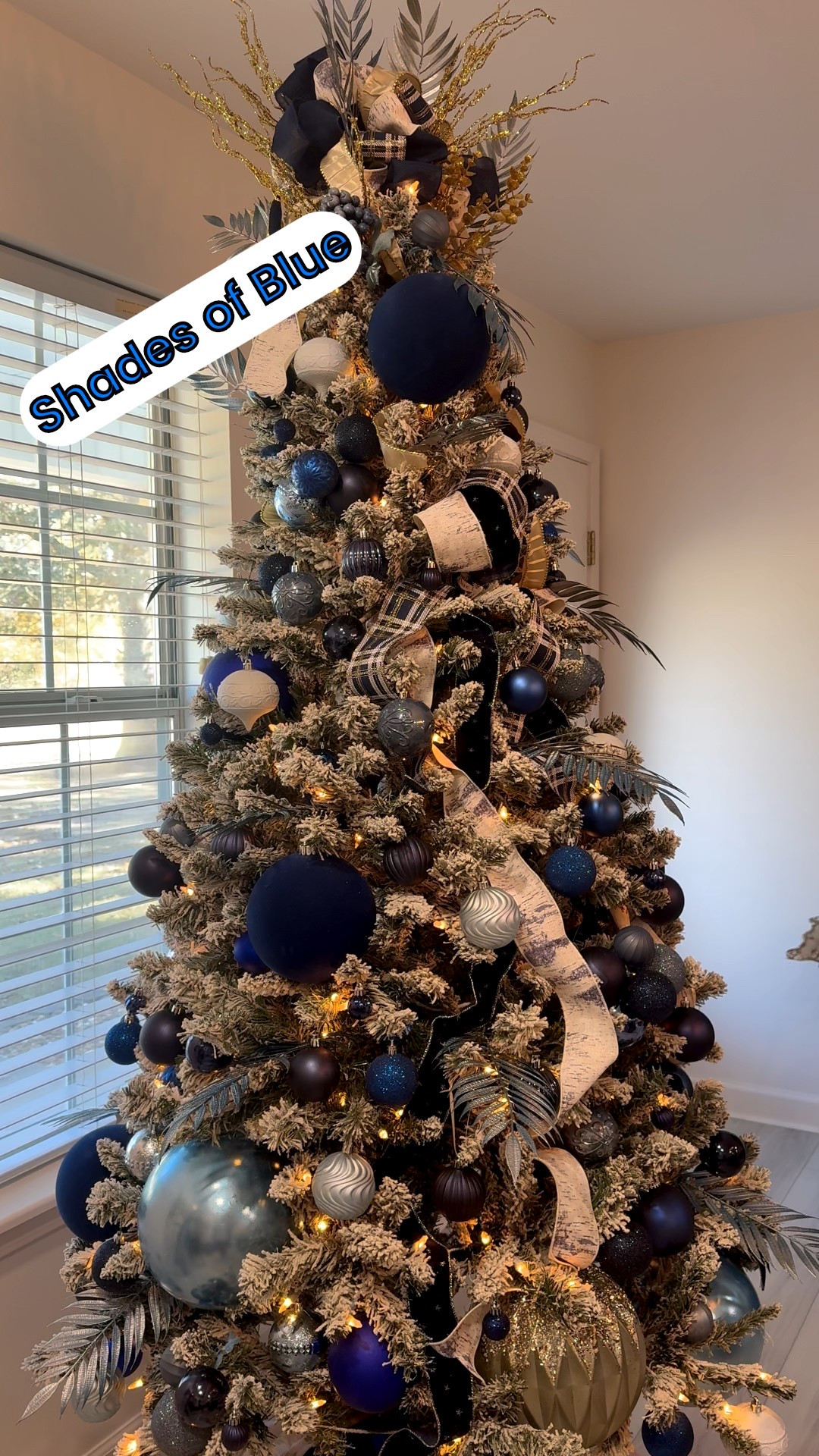 This Flocked Full of Blues tree makes me so happy! It is one of seven at the house. Yes, I used my tree turner this year. It is one of my favorite things! 

You can’t see the skirt in this shot, but I repurpose the bottom half of one of my formals! 😜 Never know what I’ll come up with. Thinking outside the box is my jam and apparently I’ve passed it on, because honestly this was my son’s idea! Somedays he does surprise me. 

#LTKSeasonal #LTKHoliday #LTKvlog