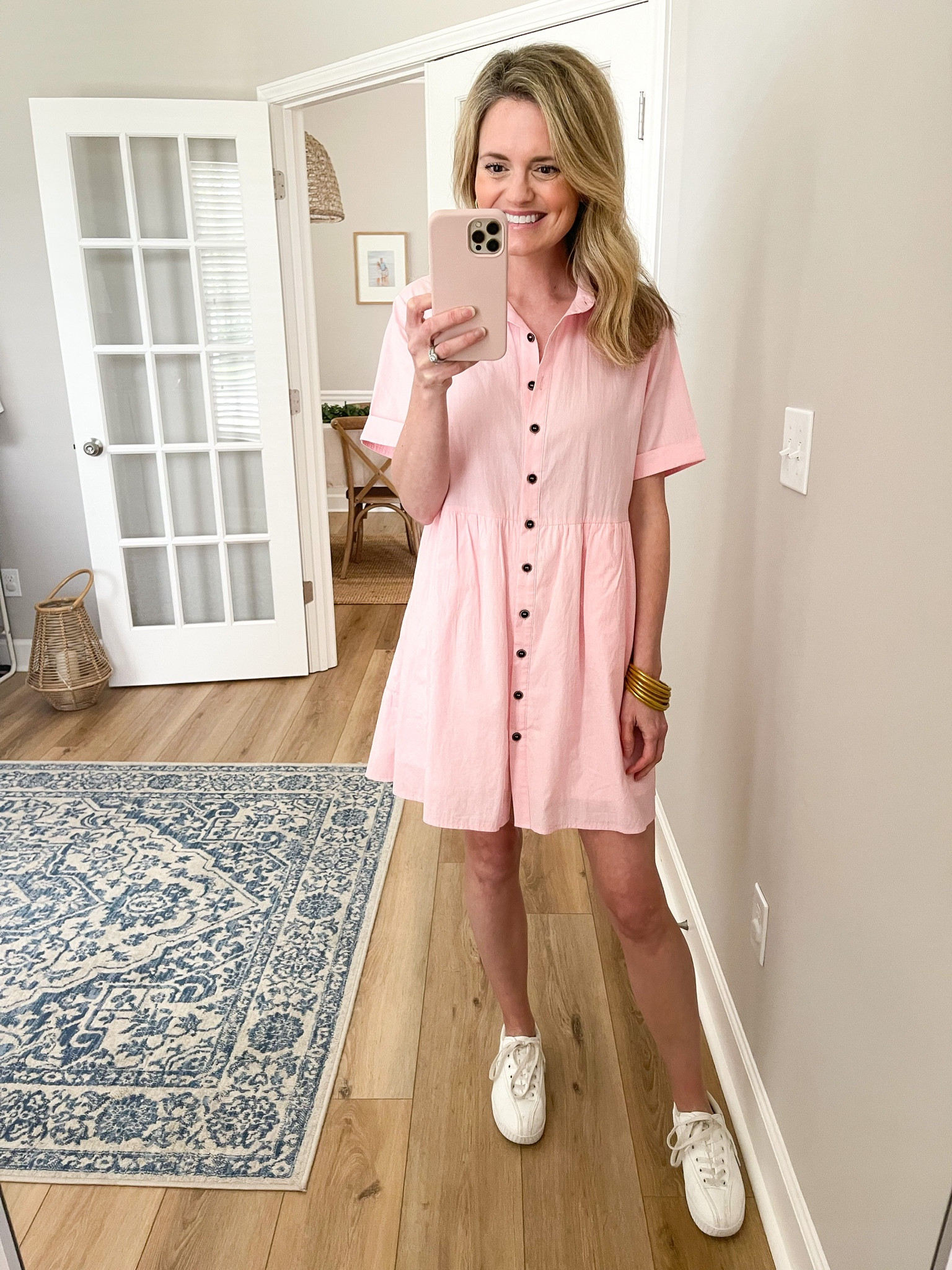 Love the light pink color of this button down dress. The buttons are functional all the way down. East to throw on with sneakers for the day or sandals. 

#LTKunder50 #LTKtravel #LTKstyletip