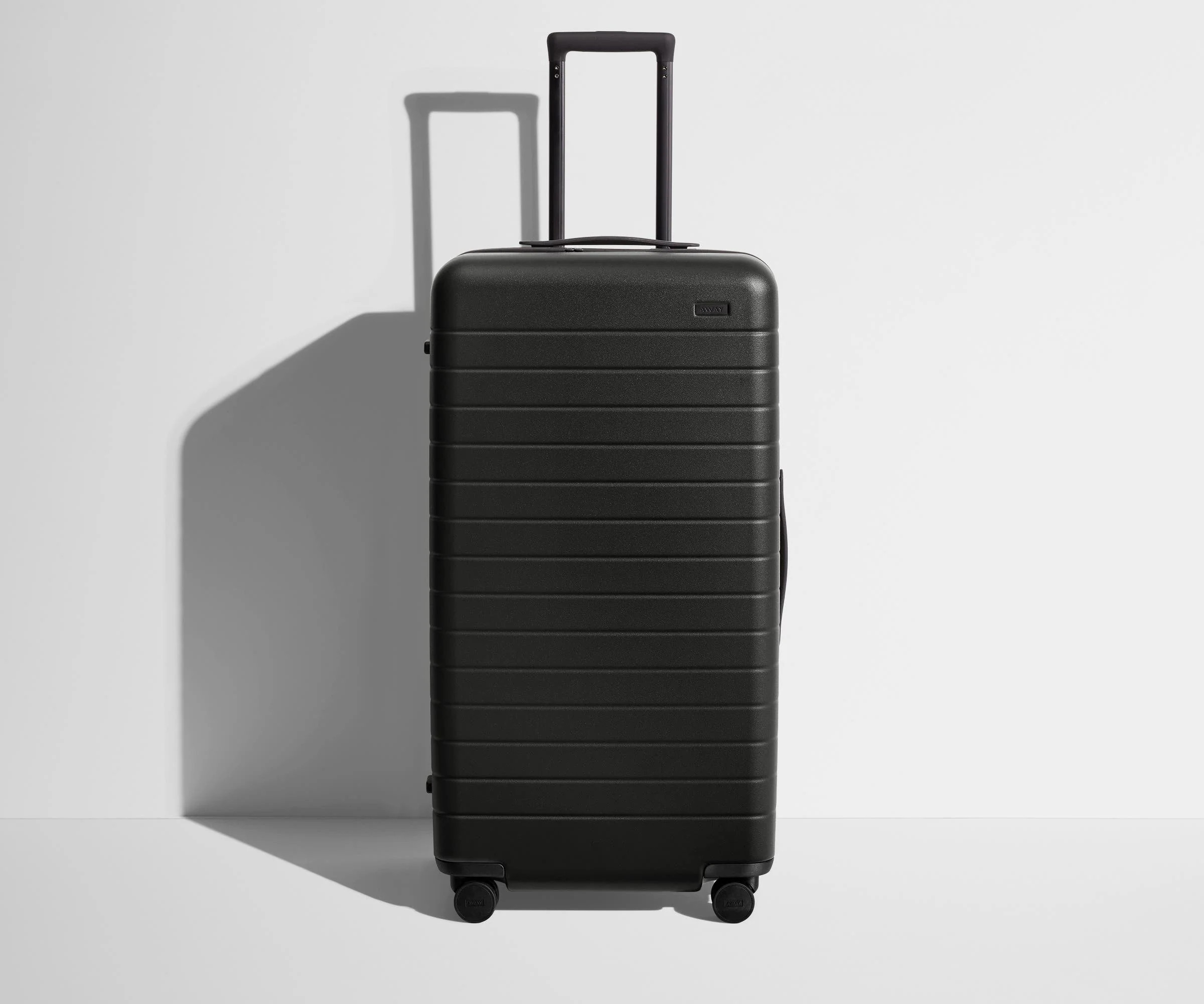 Shop The Trunk suitcase in Jet Black | Away | Away