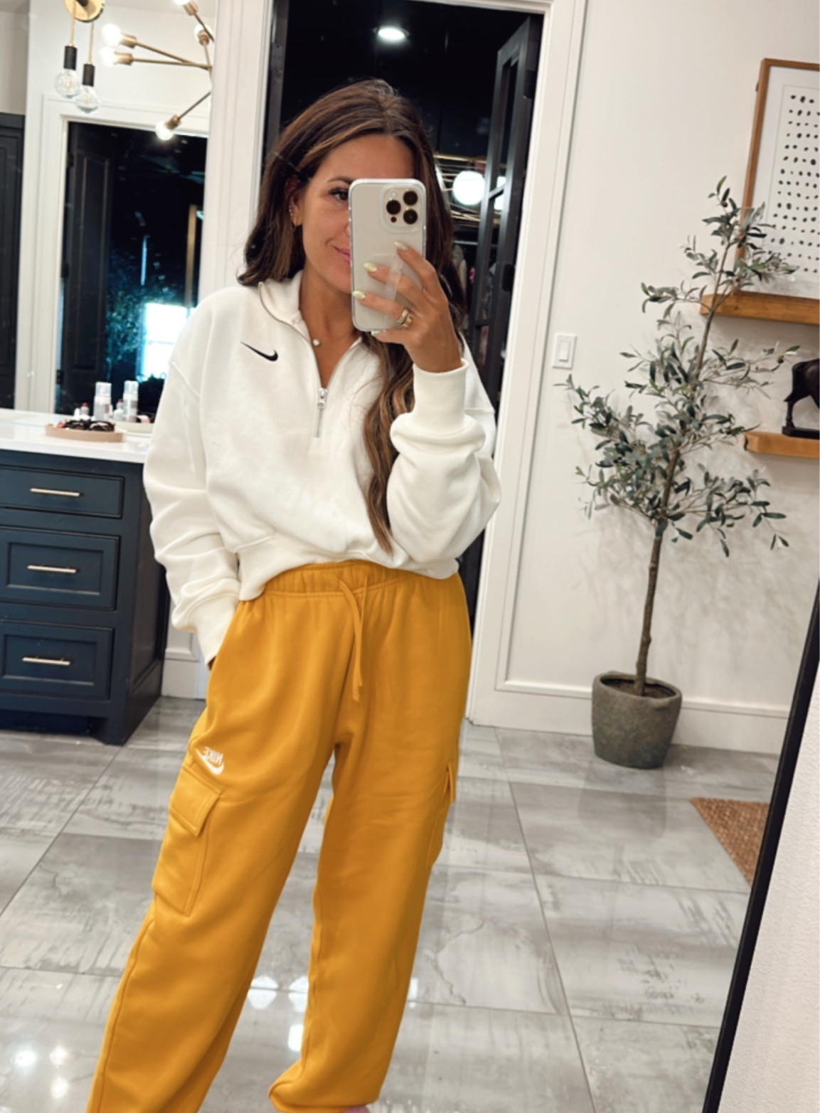 Small in nuke pullover and XS in Nike cargo sweat pants - travel outfit 

#LTKtravel #LTKstyletip #LTKunder100