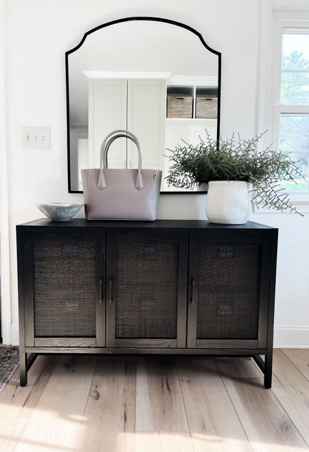 Loving our new affordable mudroom cabinet! You can see through the wicker so I used six bins (with labels) to organize our things and make it look neat behind the wicker. These bins fit perfectly with this cabinet! The mirror is also a beauty! 

#LTKhome