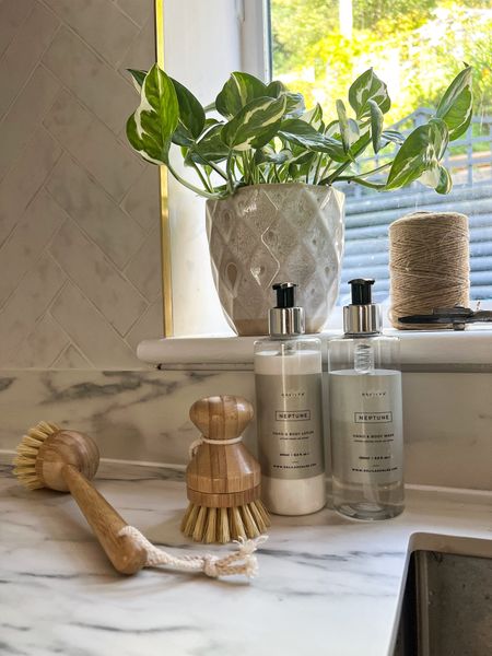 Kitchen sink essentials - hand soap and hand cream, wooden washing up brushes and a decorative plant pot 

#LTKGift (“Entry”)



#LTKeurope #LTKhome #LTKGiftGuide