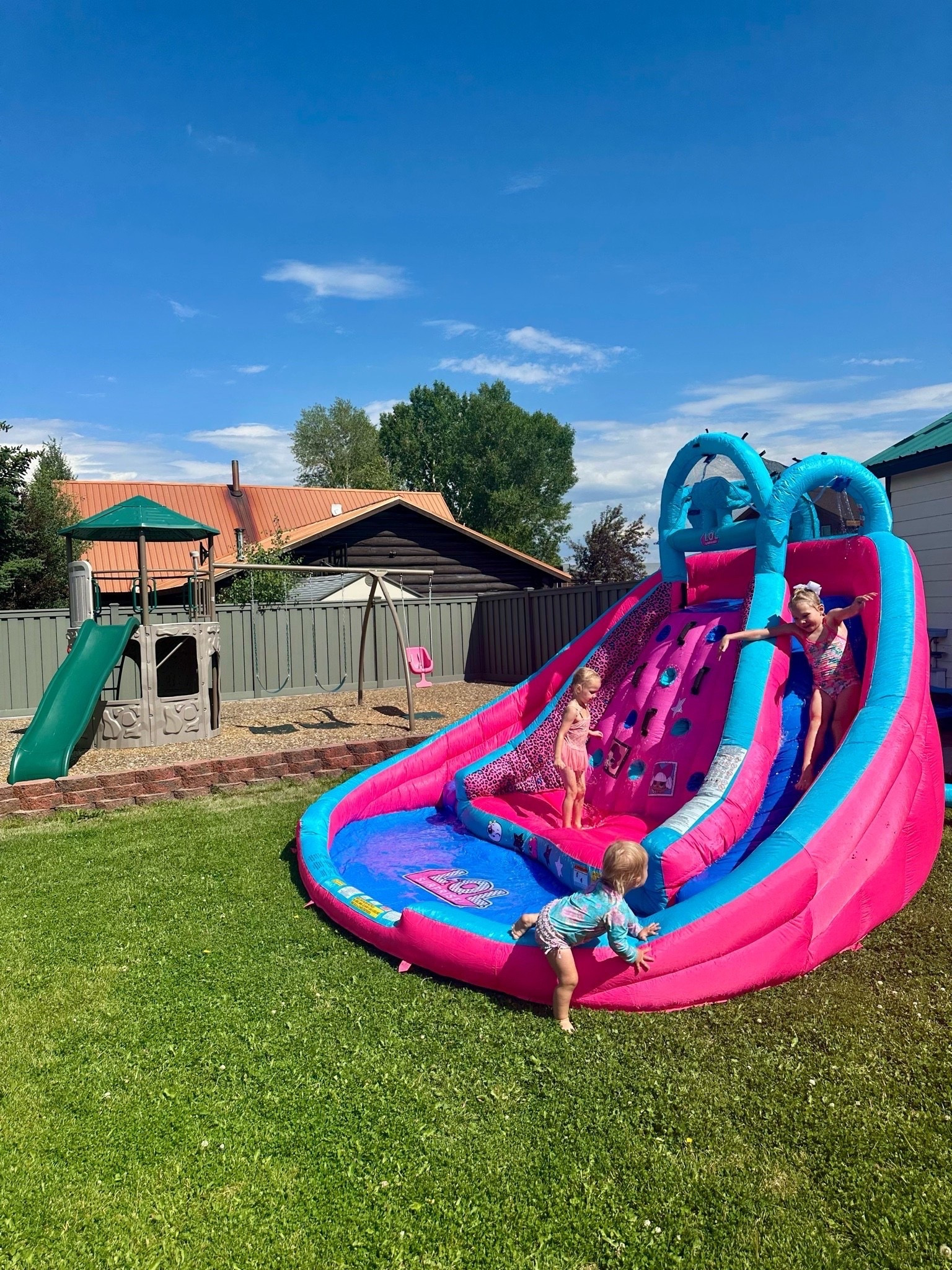 Summer fun starts in the backyard! If you're looking for a way to keep the kids entertained for hours, this L.O.L. Surprise! Inflatable River Race Water Slide is a total win. It has a climbing wall, dual slides, splash pool, and built-in water sprayers for nonstop fun. My girls have been asking to play on it every single day!
It's one of our favorite summer purchases for making memories at home. I've linked it in my LTK so you can check it out before the rest of summer flies by! 💕🌈
#LTKKids #BackyardFun #SummerEssentials #WaterSlide #MomFavorites

#LTKmomlife #LTKKids #LTKSwim