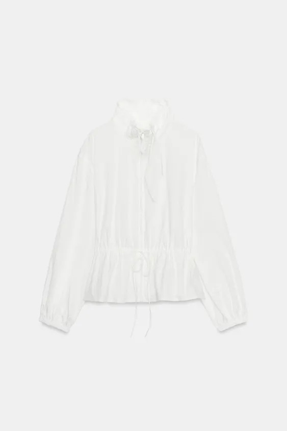 High neck jacket with long sleeves. Featuring an adjustable drawstring waist and front zip fasten... | Zara UK