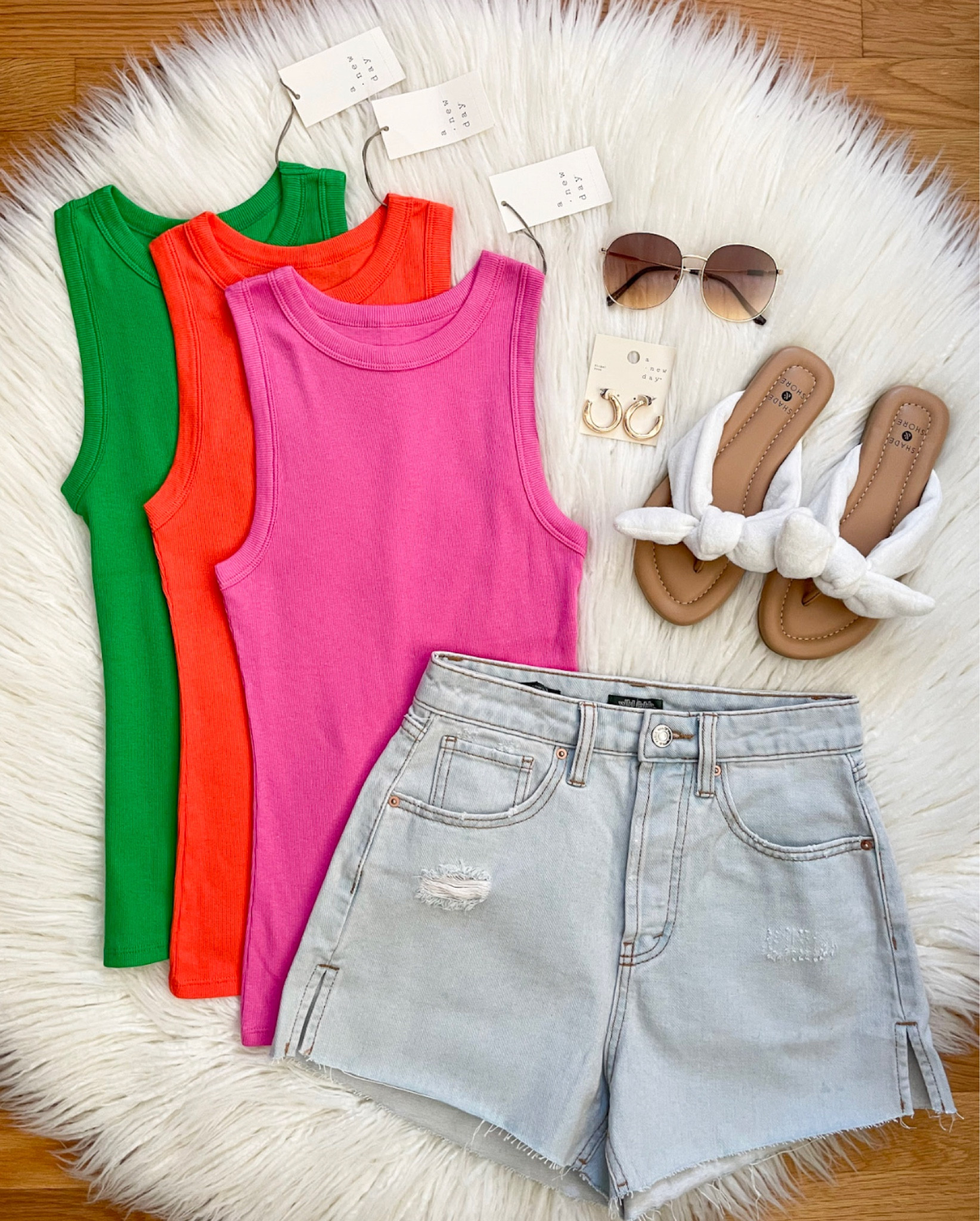 Happy FriYAY! 🎉 Our favorite tanks now come in NEW bright colors!  Such a great basic & they are great for layering too!  Paired them with the new shorts & sandals all from Target!  Have the best day friends!

#LTKstyletip #LTKshoecrush #LTKunder50