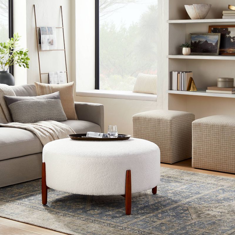 Elroy Sherpa Round Cocktail Ottoman with Wood Legs Cream - Threshold™ designed with Studio McGe... | Target