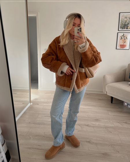 full winter outfit mode on with a faux brown shearling cosy oversized jacket, blue straight leg jeans and ugg ultra mini boots

#LTKstyletip #LTKSeasonal #LTKeurope