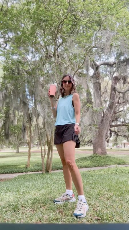 Linked same Lululemon tank - color no longer available. Lots of other colors though! I wear size 6 in lululemon tanks. 
Amazon tennis skirt. Build in shorts underneath. Wearing size small  

#LTKfitness #LTKVideo