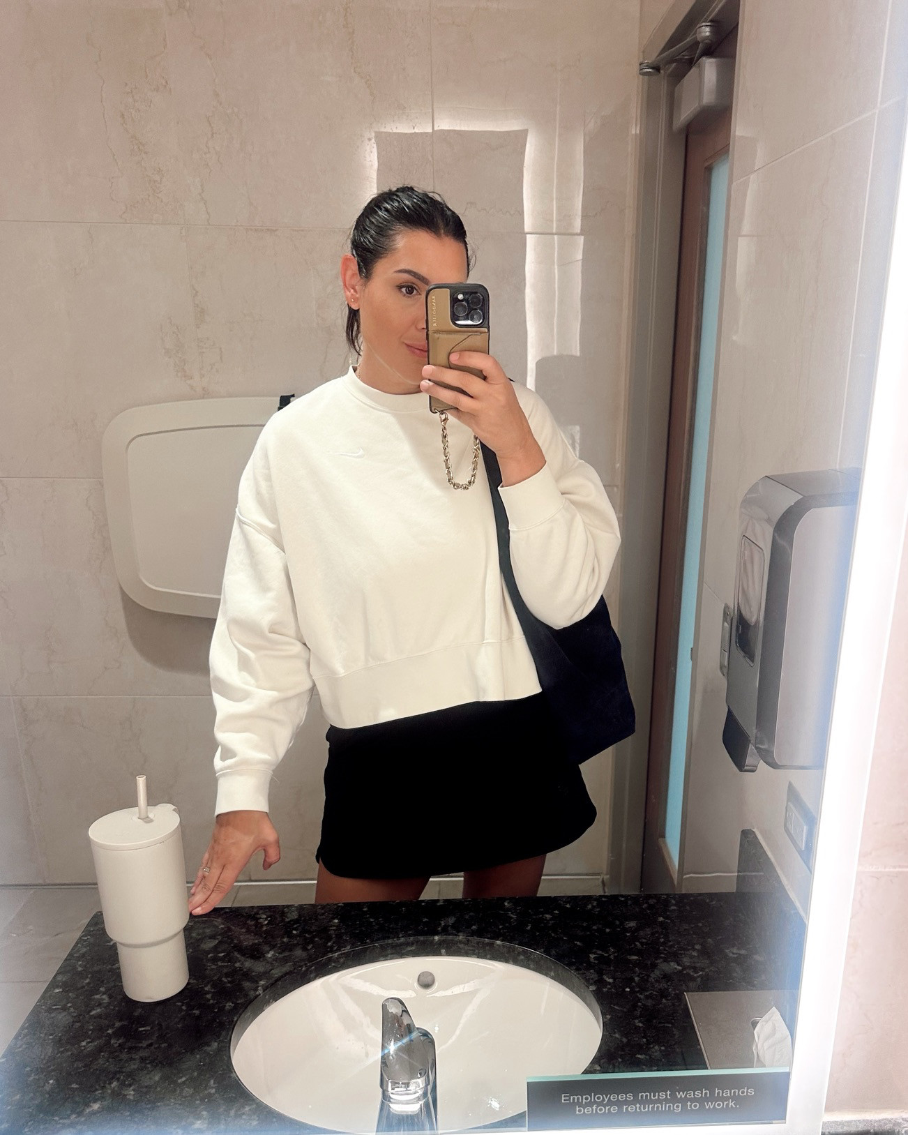 What I wear to the gym! I'm in my favorite sweatshirt of all time and an Amazon skort that doesn't ride up when you walk! 

Sweatshirt: medium
Skort: large 

 