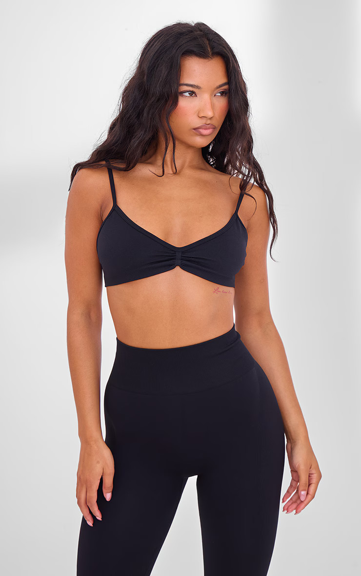 PLT Sport Black Seamless Twist Front Sports Bra | Pretty Little Thing (Australia & New Zealand)