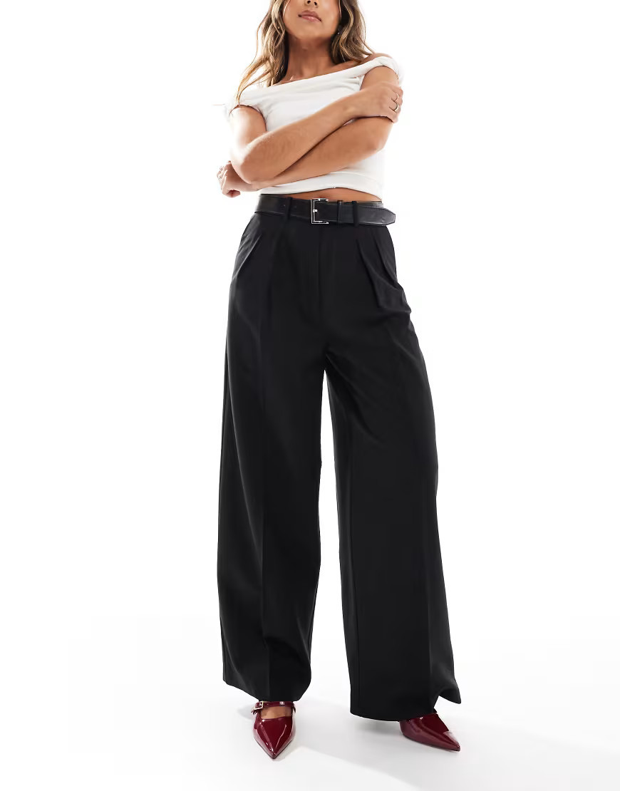 ASOS DESIGN – Elegante Hose in Schwarz mit Gürtel und lockerem Schnitt | ASOS (Global)