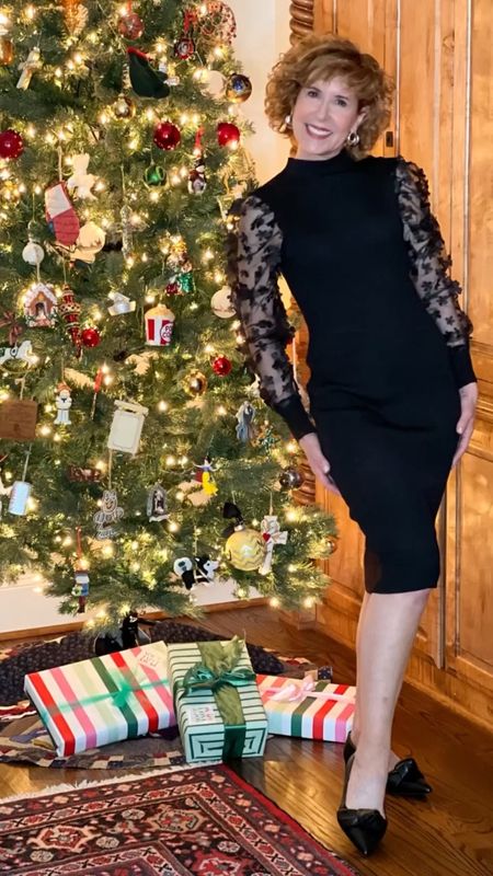 #ad This black sweater dress with the 3D flower appliqués on the sheer sleeves is an amazing value! I sized up two sizes so it would still fit but not be too clingy! It also comes in red, which I linked below. I paired it with black pointed toe flats.

#WalmartFashion is the place for affordable holiday fashion gifts! I’m sharing some of my favorites here, in my gift guides, and in EmptyNestBlessed.com.

Affordable gifts, Walmart fashion, holiday fashion, holiday style, affordable fashion, sweater dress, sheer sleeves, black dress, black flats, silver hoops

#LTKSeasonal #LTKHoliday #LTKGiftGuide