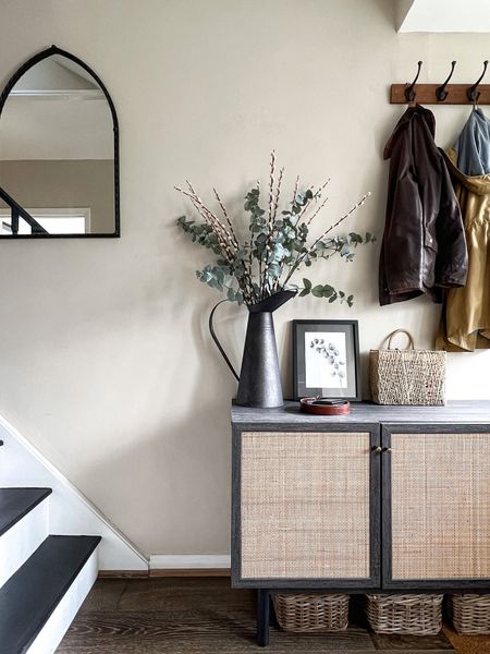 Hallway storage ideas using wicker baskets for small seasonal accessories like hats gloves and scarves, dining room sideboard for shoe storage, trinket tray for everyday items like keys, wall mounted coat rack and umbrella stand to keep by the door as a visual reminder so that you never get caught out 

#LTKeurope #LTKfamily #LTKhome