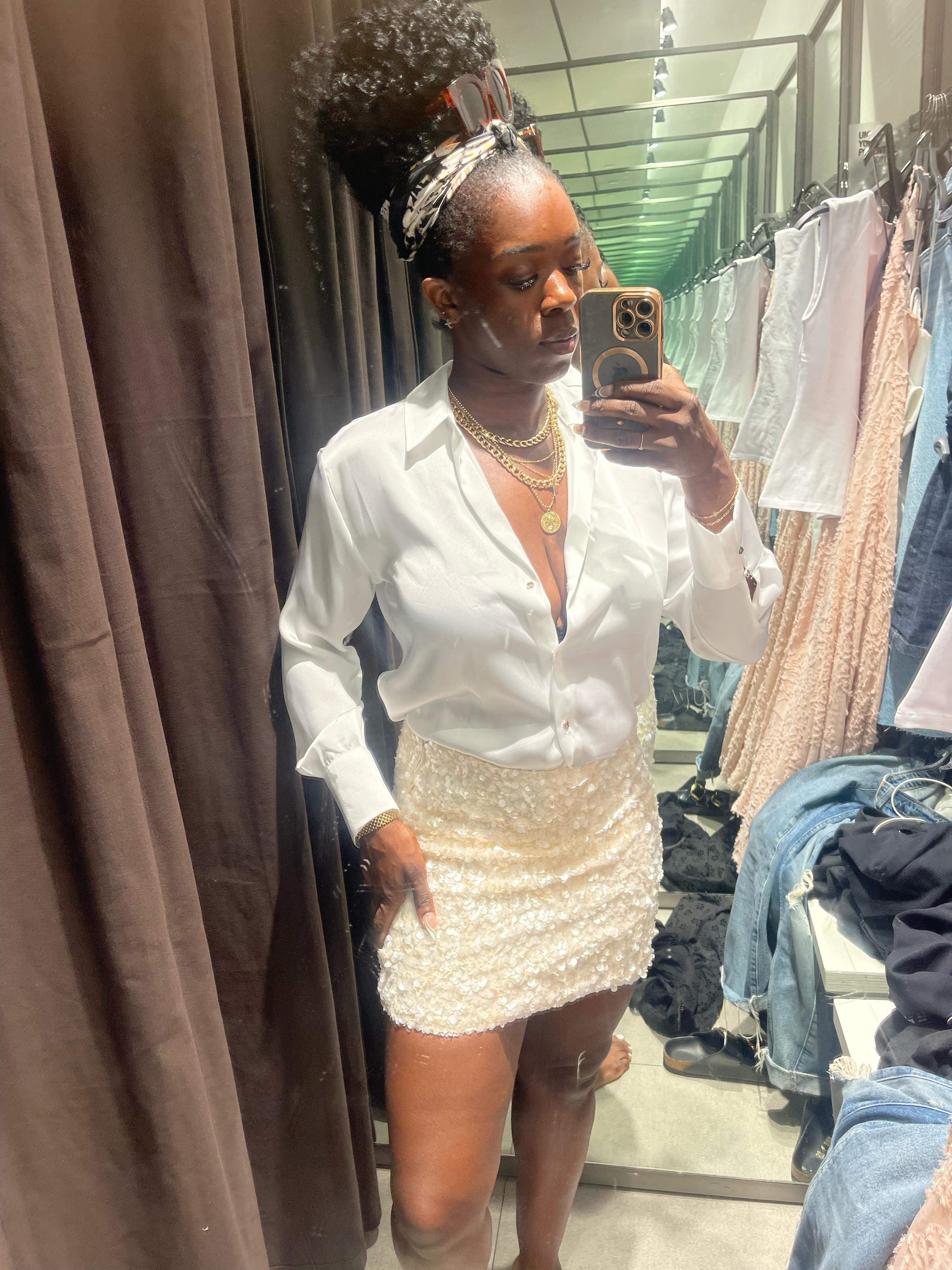 Crisp white shirt + textured mini = classic with a twist. This look is giving brunch, date night, and everything in between. 

 #LTKSeasonal #LTKFindsUnder100 #LTKStyleTip