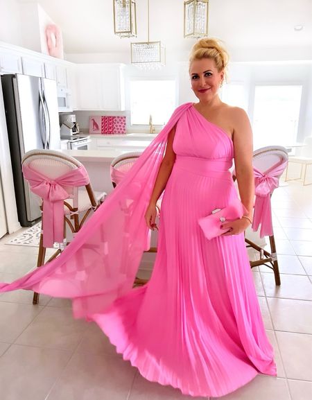 I’m obsessed with this Barbie pink dress! It’s absolutely stunning! Just look at this one shoulder chiffon maxi! WOW!!!! 

Wait for it, it’s under $50! Can you believe it?

I’m wearing a medium size 6. Just FYI, there’s no stretch in the chest area. I’m a B cup and it fits. It zips up the side and there’s no stretch there either.

Also, check out my pink bow clutch and rhinestone heeled sandals. Great outfit for a special occasion!

This dress also has an inside lining. It’s FANTASTIC. You will get compliments when you wear it!
 
Valentine’s Day never looked so Good!!




#LTKwedding #LTKGiftGuide #LTKSeasonal