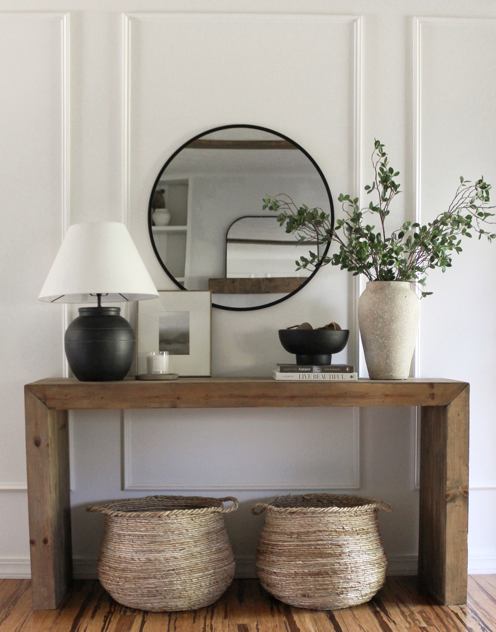 Beautiful artisan designer look for less lamp back in stock! Entryway styling 

Console table. Lamp. Table lamp. Black lamp. Vase. Textured vase. Pottery barn decor. PB. Foyer. Entryway. Console table decor. Round mirror. Neutral decor. Neutral art. Decorative bowl. Black bowl. Basket. World market decor  

#LTKhome #LTKFind #LTKsalealert
