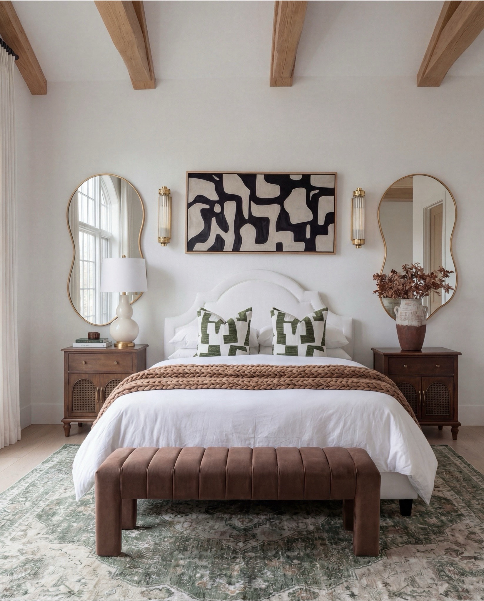 Shop the Look:
• White upholstered arched headboard bed
• White cotton duvet cover + pillow shams
• Green vintage-style area rug (distressed pattern)
• Brown chunky knit throw blanket
• Dark wood nightstands with cane doors
• White ceramic table lamp (round base)
• Brass wall sconces with glass shades
• Organic shape gold wall mirrors
• Black and beige abstract framed wall art
• Green geometric throw pillows
• Upholstered brown bench (channel tufted)
• Dark wood dresser with brass pulls
• Round ivory accent chair
• Cream throw blanket (soft knit texture)
• Tall brass floor lamp with white shade
• Decorative book stack (neutral tones)
• Small wood decorative box
• Brass round tray
• White pedestal decorative bowl
• Marble candle holders with brass rings
• Taper candles (ivory)
• Large ceramic vase with dried stems

#LTKSaleAlert #LTKHome