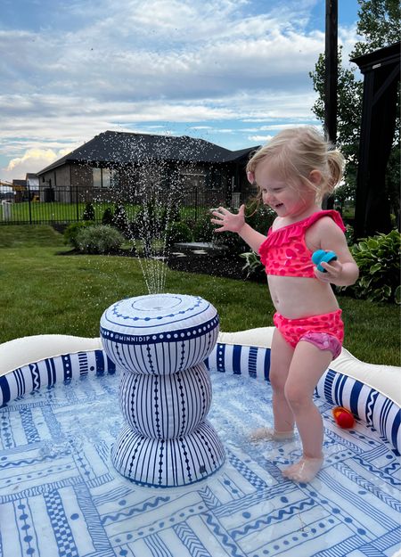 Is this not the CUTEST swimsuit and fountain sprinkler toy? It’s better than the average splash pad because it holds more water, almost like a splash pad baby pool hybrid. Love that it doesn’t have as high of a wall either so it can’t be filled as high. Just enough water to splash around while enjoying the fountain! L

Swimmie is in limited stock, marked down, buy now if you’re interested!

#LTKHome #LTKKids #LTKSummerSales