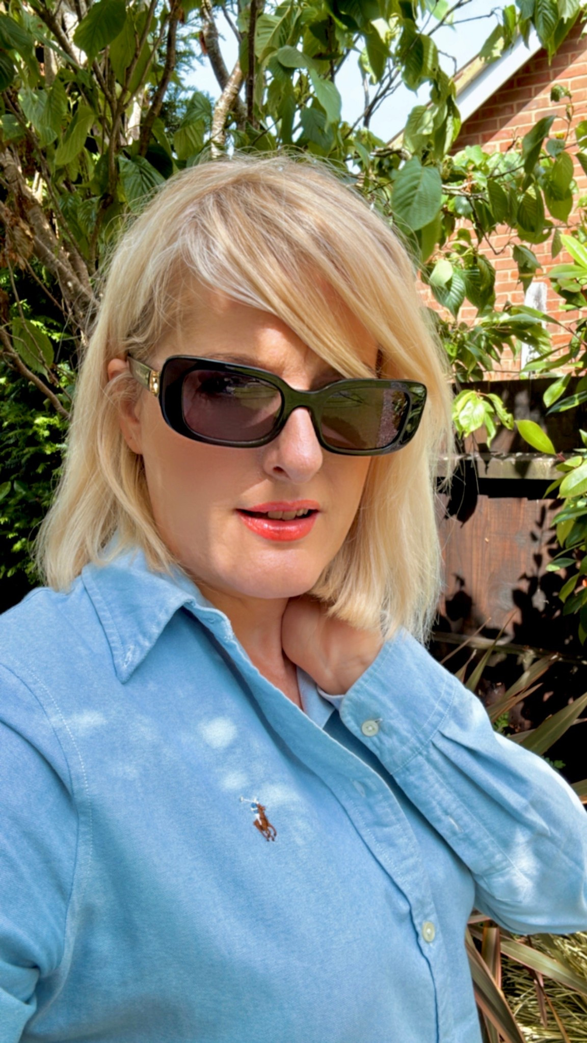 Hi everyone! I have a sunglasses addiction! I wear them all seasons even when it’s overcast. I bought these from Holland Cooper as they’re not my usual style but I thought they were quite chic looking. They are more of a slimline shape & very comfortable, not too heavy like some styles. I think they can be worn summer through to winter, with any outfit. 
I’m wearing a classic blue Oxford shirt from Ralph Lauren. It’s a wardrobe staple, timeless. I wear it year on year. 

U.K. blogger, tall, midsize, luxury, luxe, over 40  



#LTKsummer #LTKluxury #LTKxRalphLauren