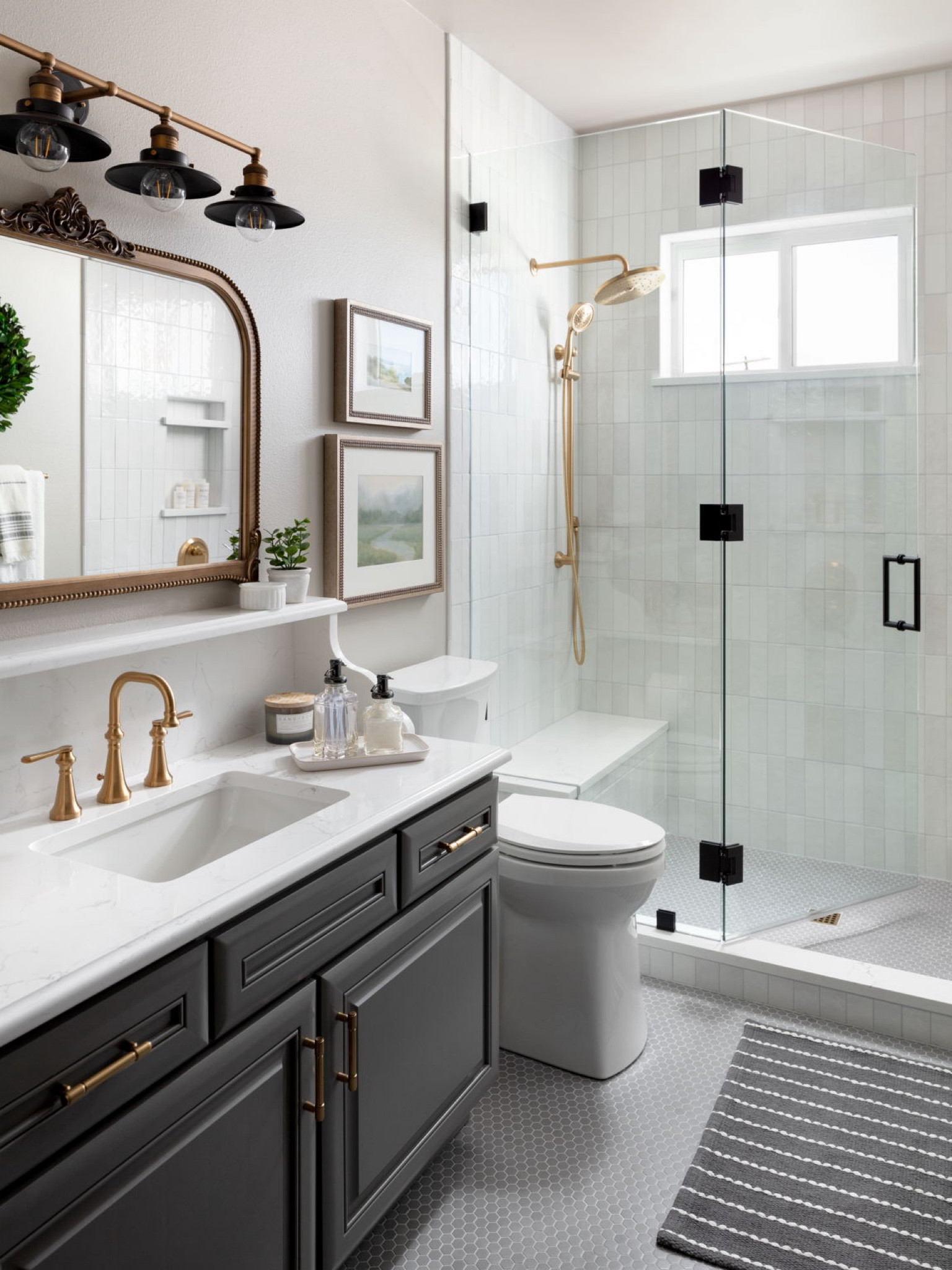 This stunning bathroom remodel blends modern functionality with elegant details, creating a serene and sophisticated retreat. 

A neutral palette and thoughtfully selected materials ensure both style and comfort, while high-end fixtures and natural elements enhance the luxurious spa-like atmosphere.

#LTKHome #LTKFindsUnder100 #LTKSaleAlert